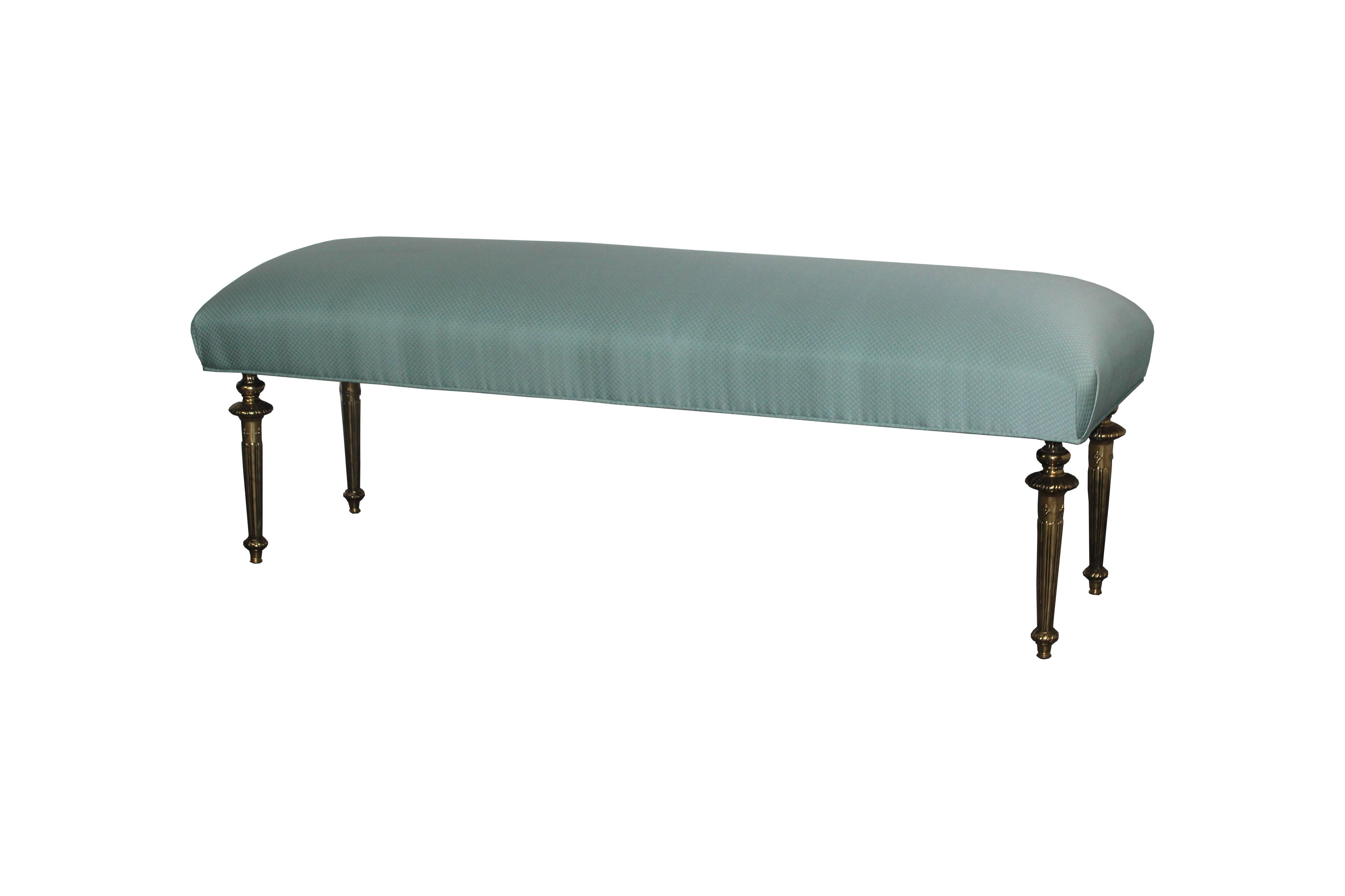 Mid-Century  brass bench. The upholstery is original.
