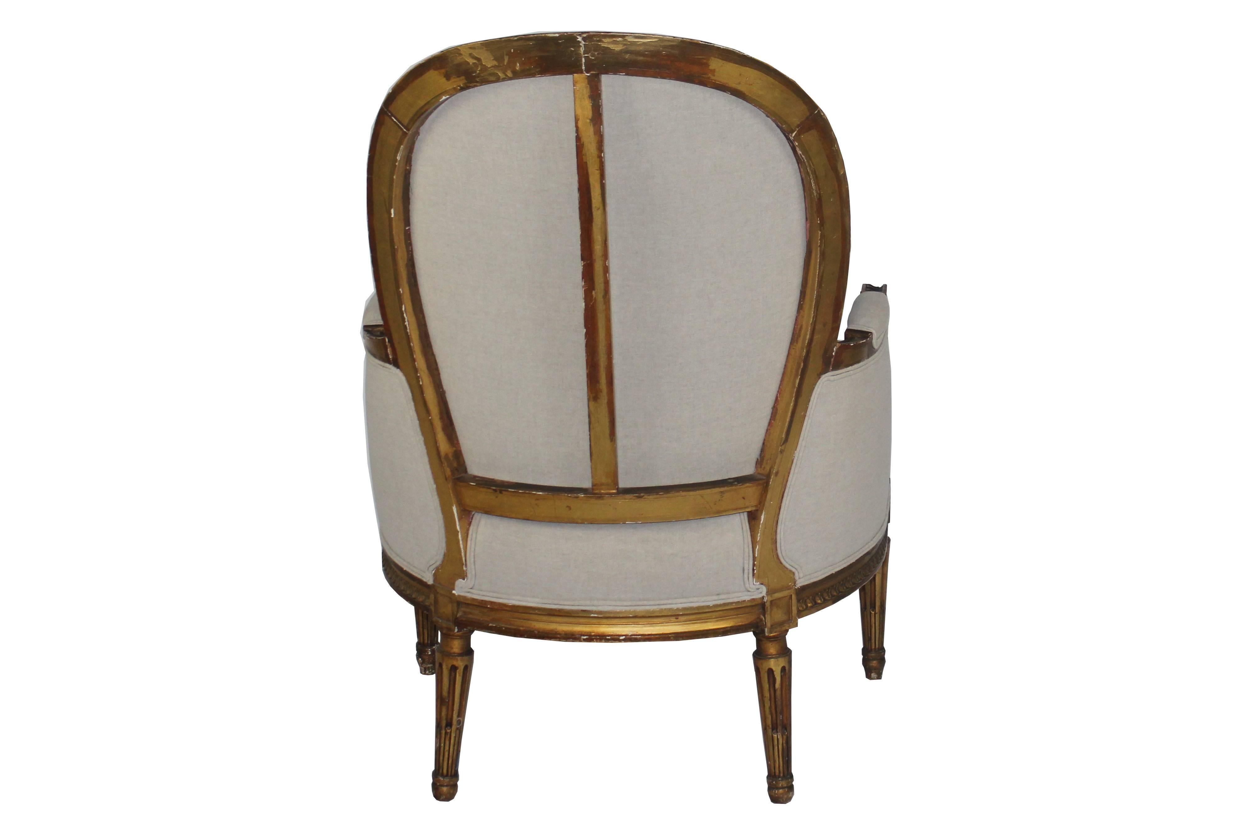 Pair of Louis XVI style chairs with round back. Upholstered in linen.