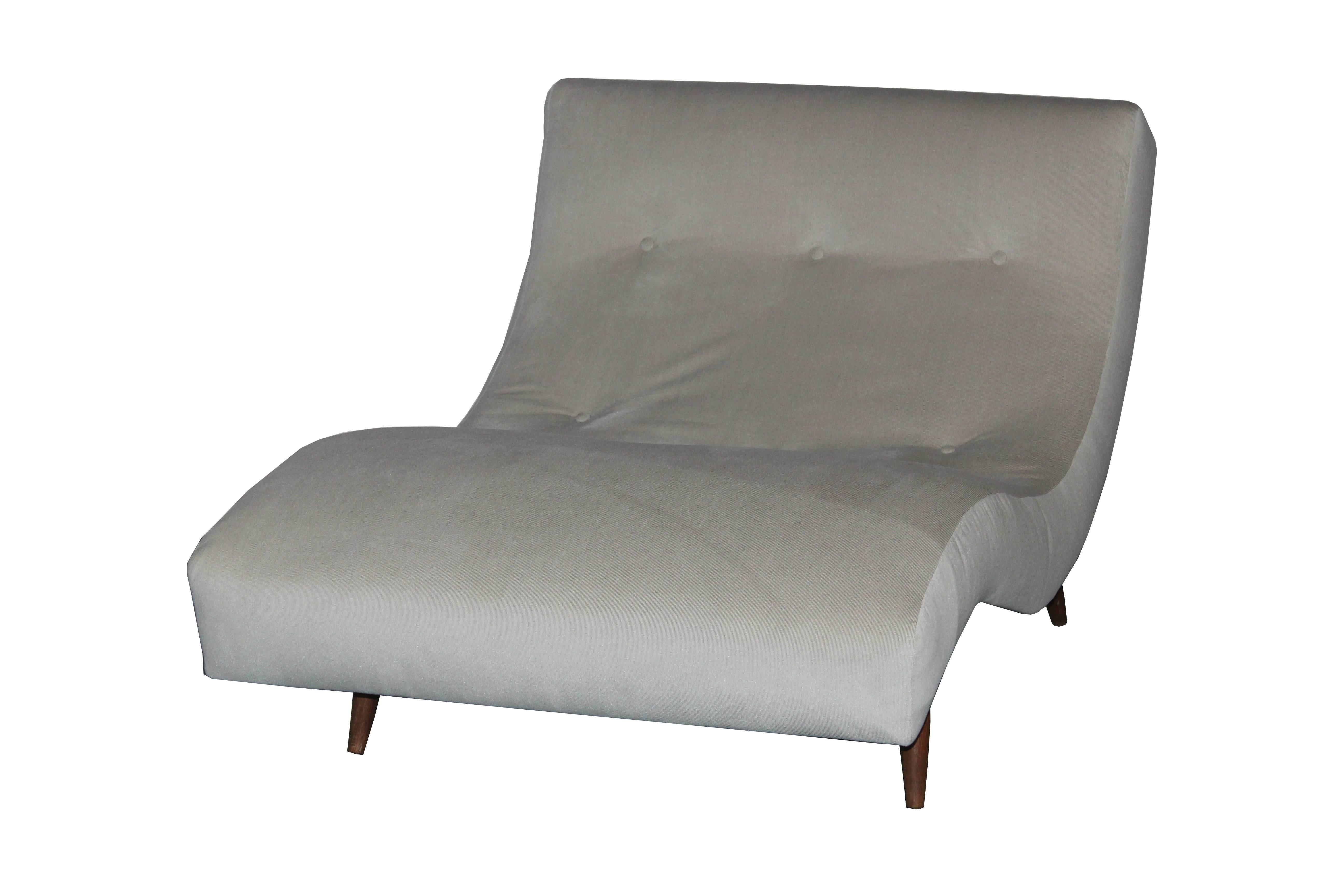 Wave shape chaise lounge. Newly upholstered in velvet and chenille mix. Teak legs.