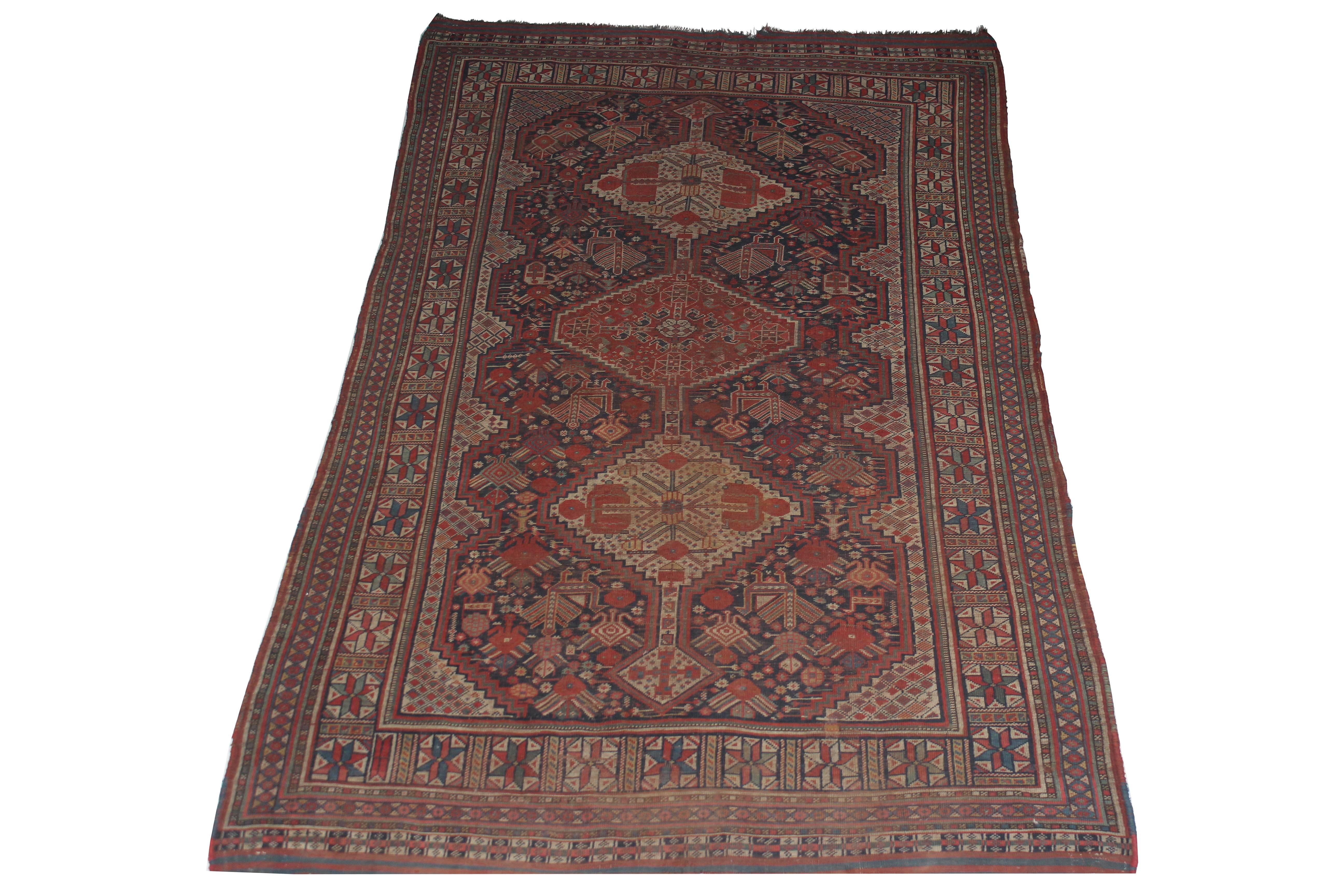 1910 handmade Persian Shiraz rug. Colors are natural earth tones .