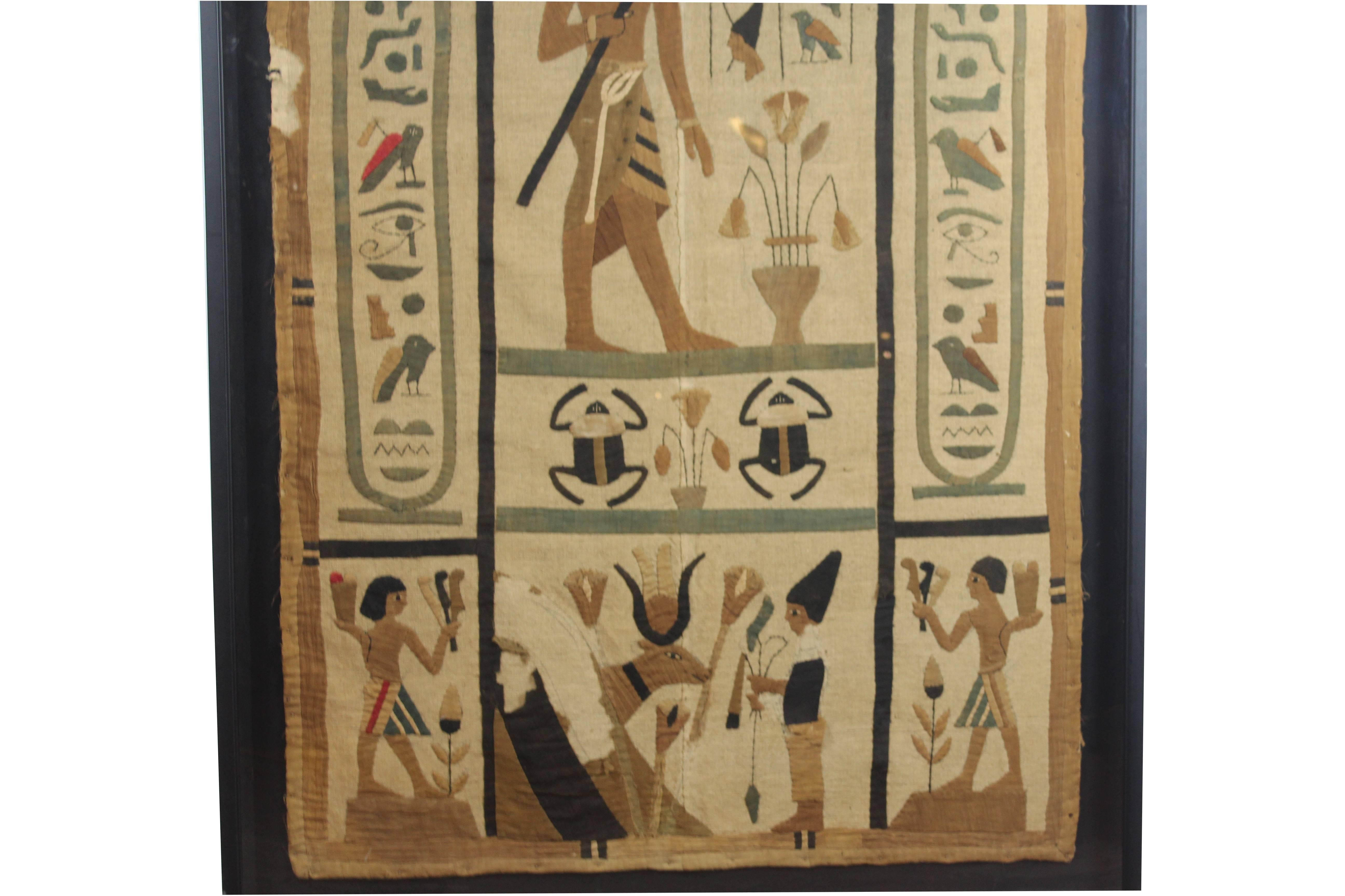 Ancient Egyptian tomb-cloth fragment, applied to a later backing in the 19th century. Fragments are colored with (now faded) vegetable dye's. Probably from the 