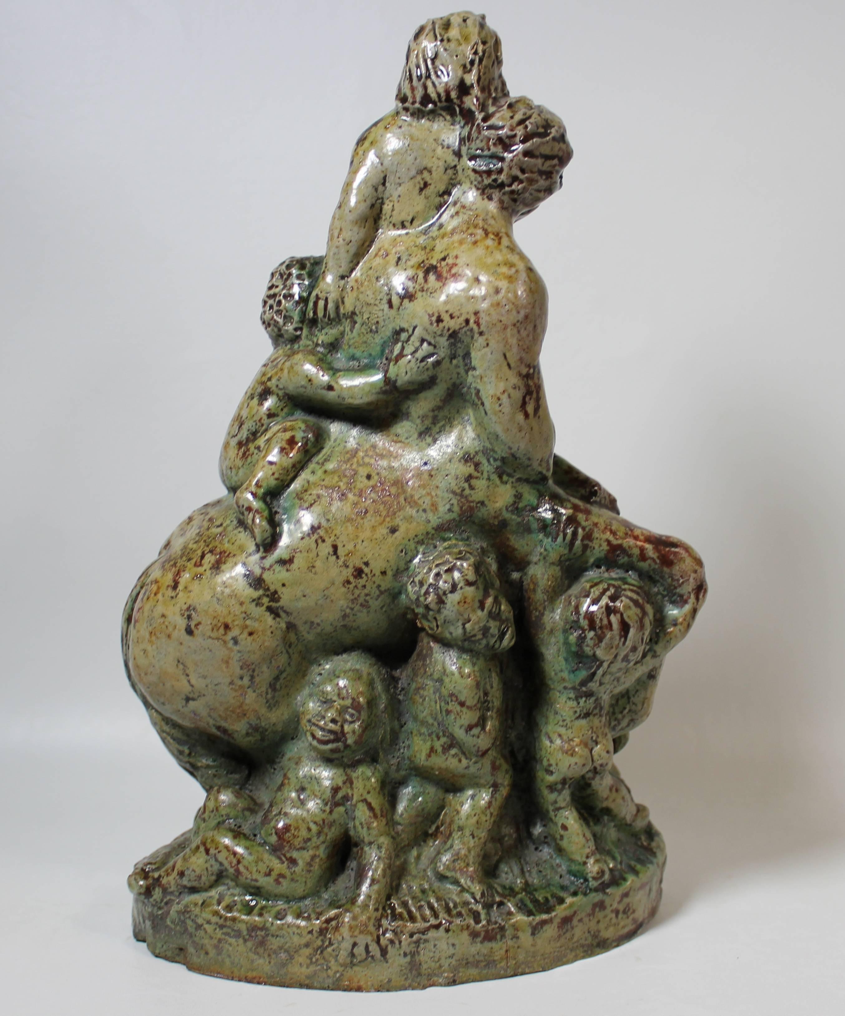 Terraco Beesel Draak pottery sculpture of mythological Greek satyr with horned children.