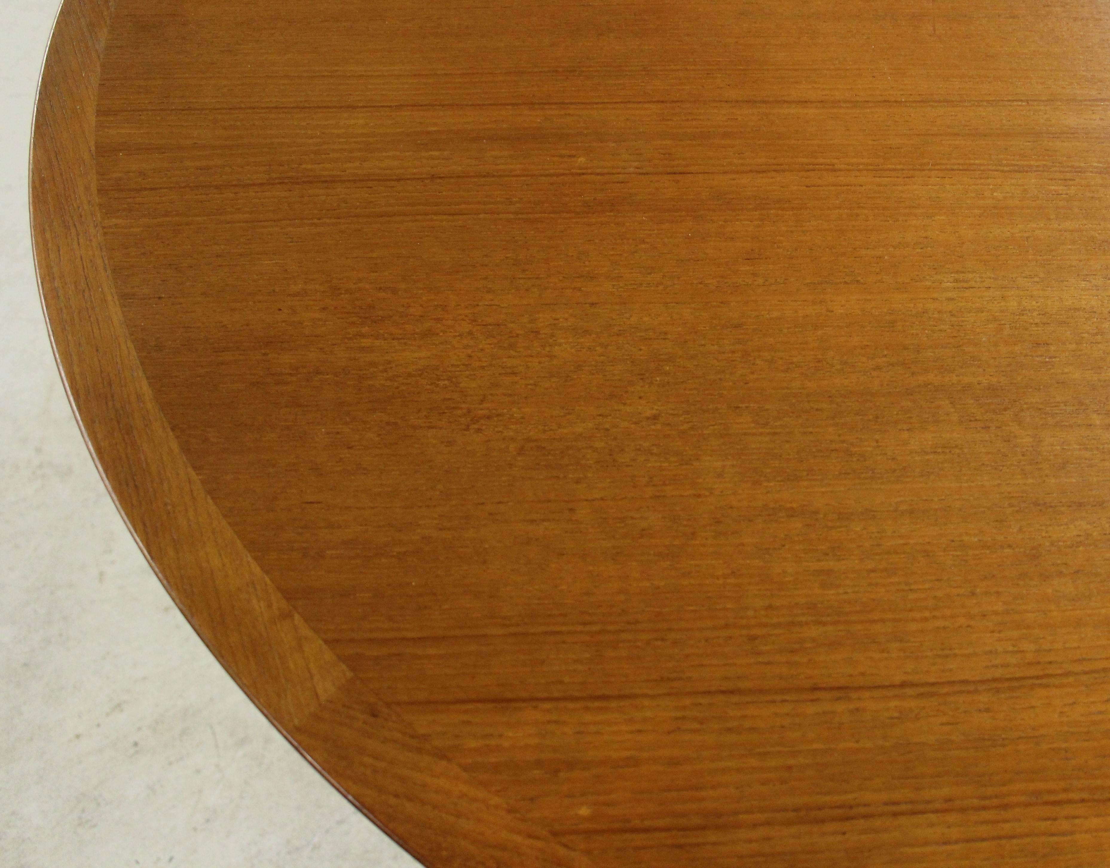 Danish teak dining table with butterfly leaf by N & R Mobler.