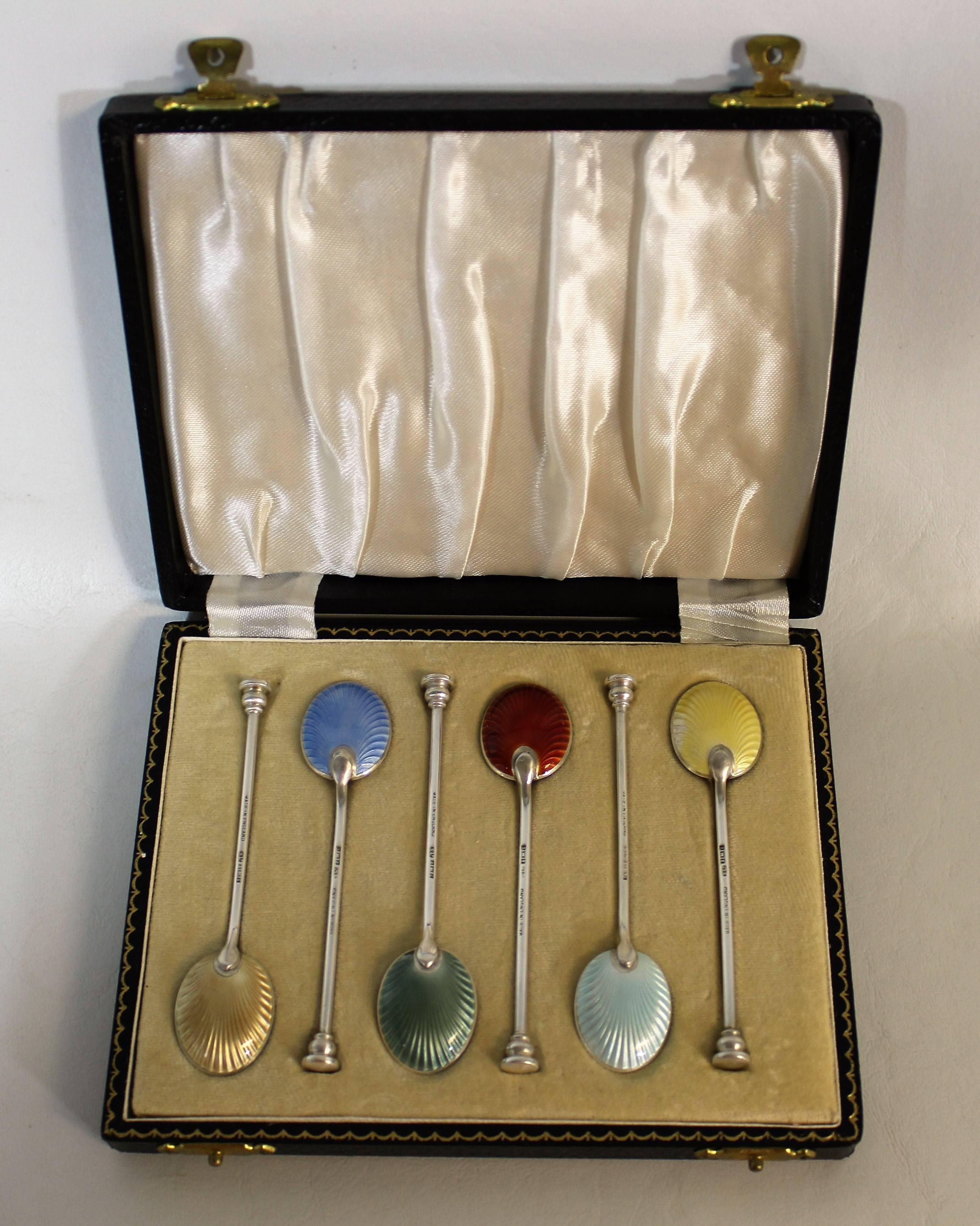 William Suckling sterling silver guilloche enameled spoons.

Made in Birmingham England and in original box.