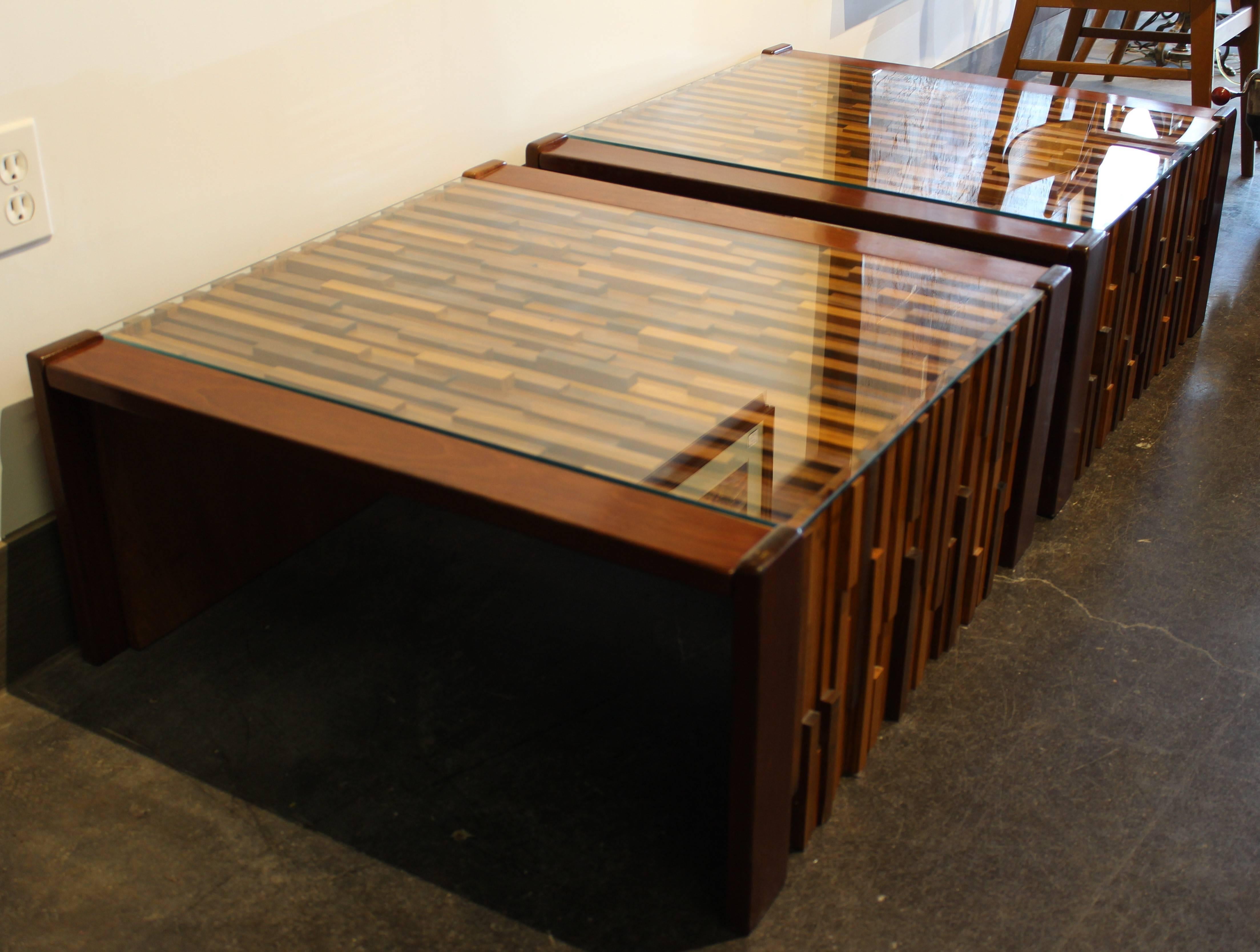 Pair of Percival Lafer Brutalist cocktail or side tables.

This spectacular set of modernist tables were done by the pioneering Brazilian designer 'Percival Lafer'. They feature solid rosewood frames around dramatic mosaic inlays of teak, jacaranda