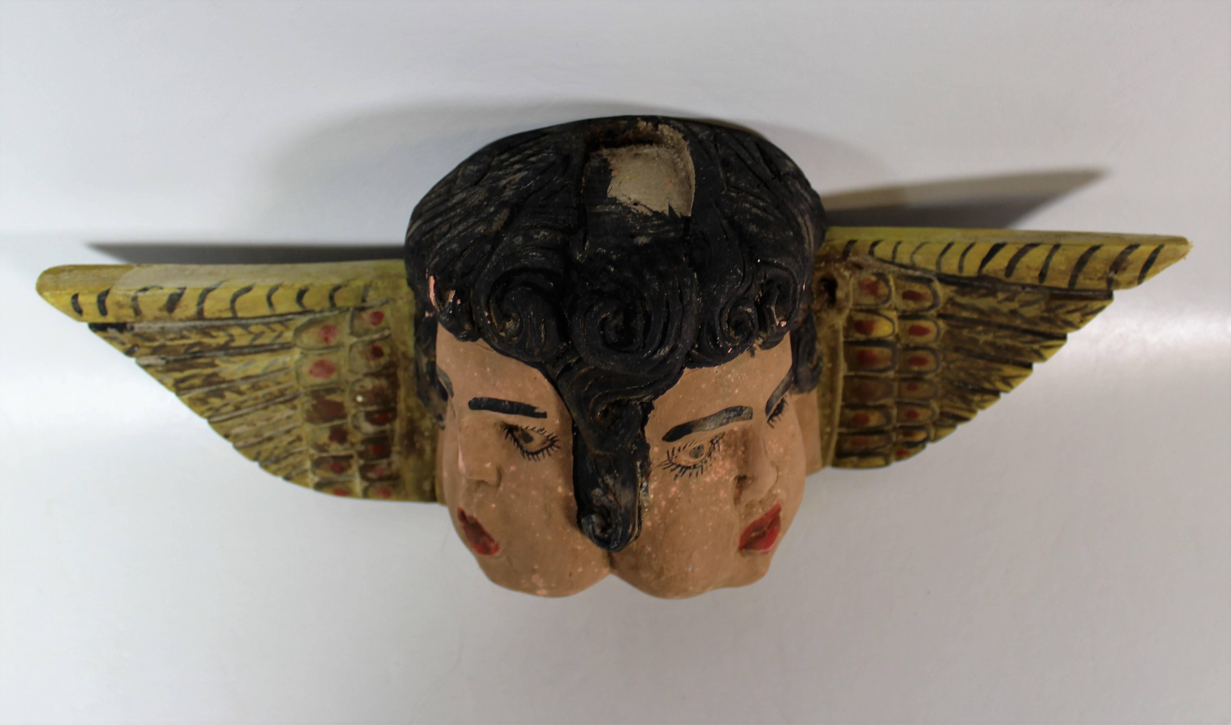 Folk Art Hand-Carved Double Faced Cherubs In Fair Condition In Hamilton, Ontario