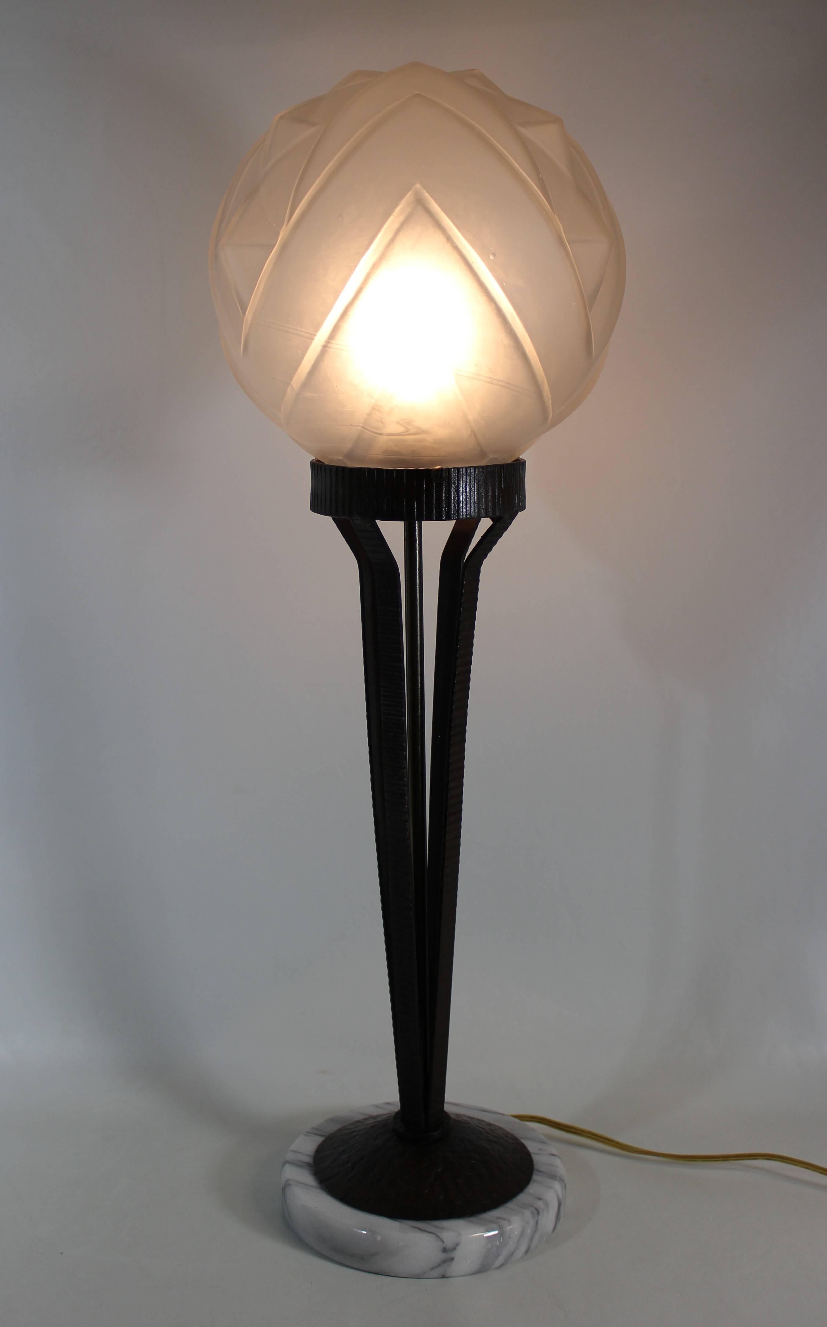 Beautiful cast iron Art Deco lamp with marble base.