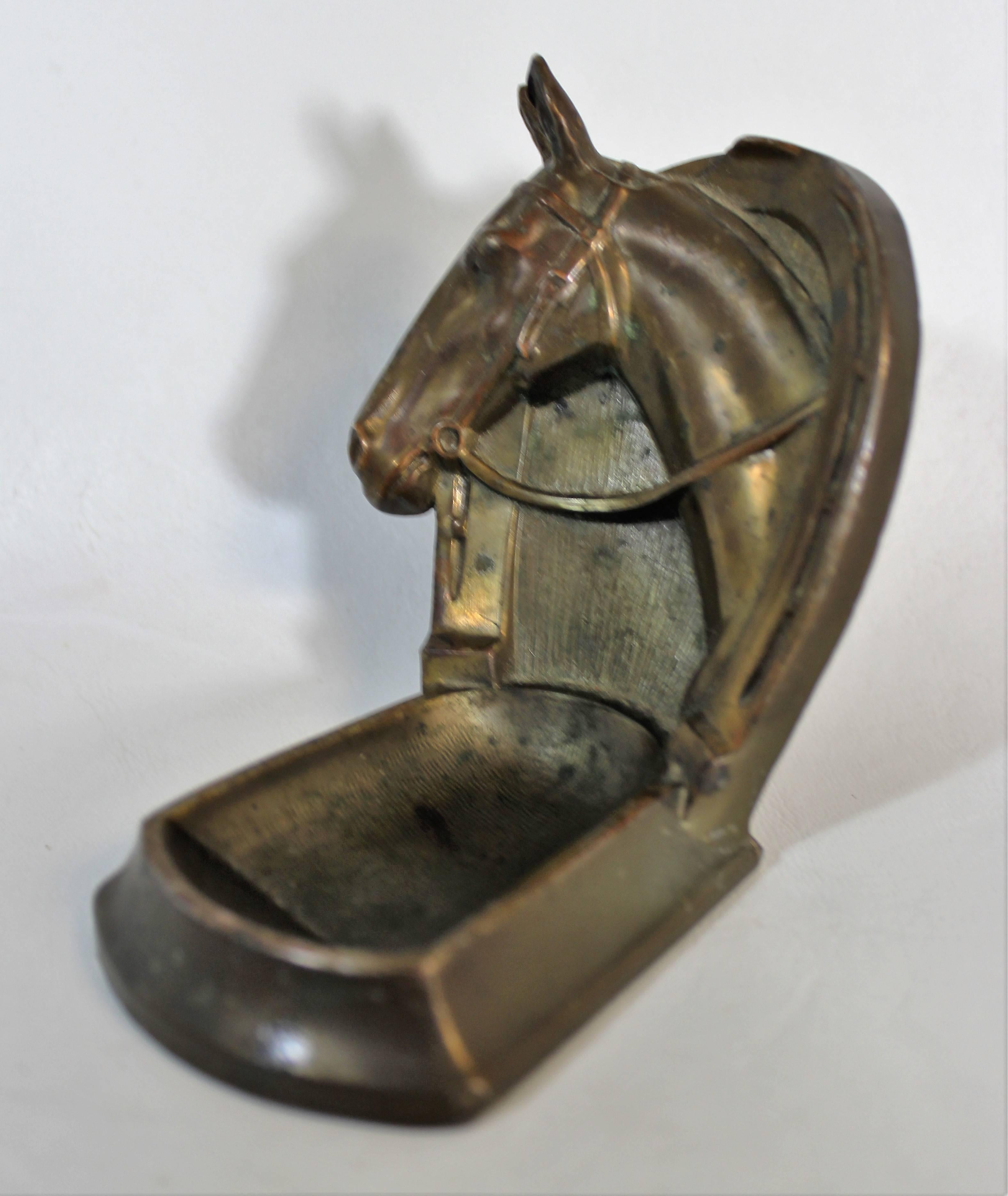 Bronze horse tobacco pipe holder.