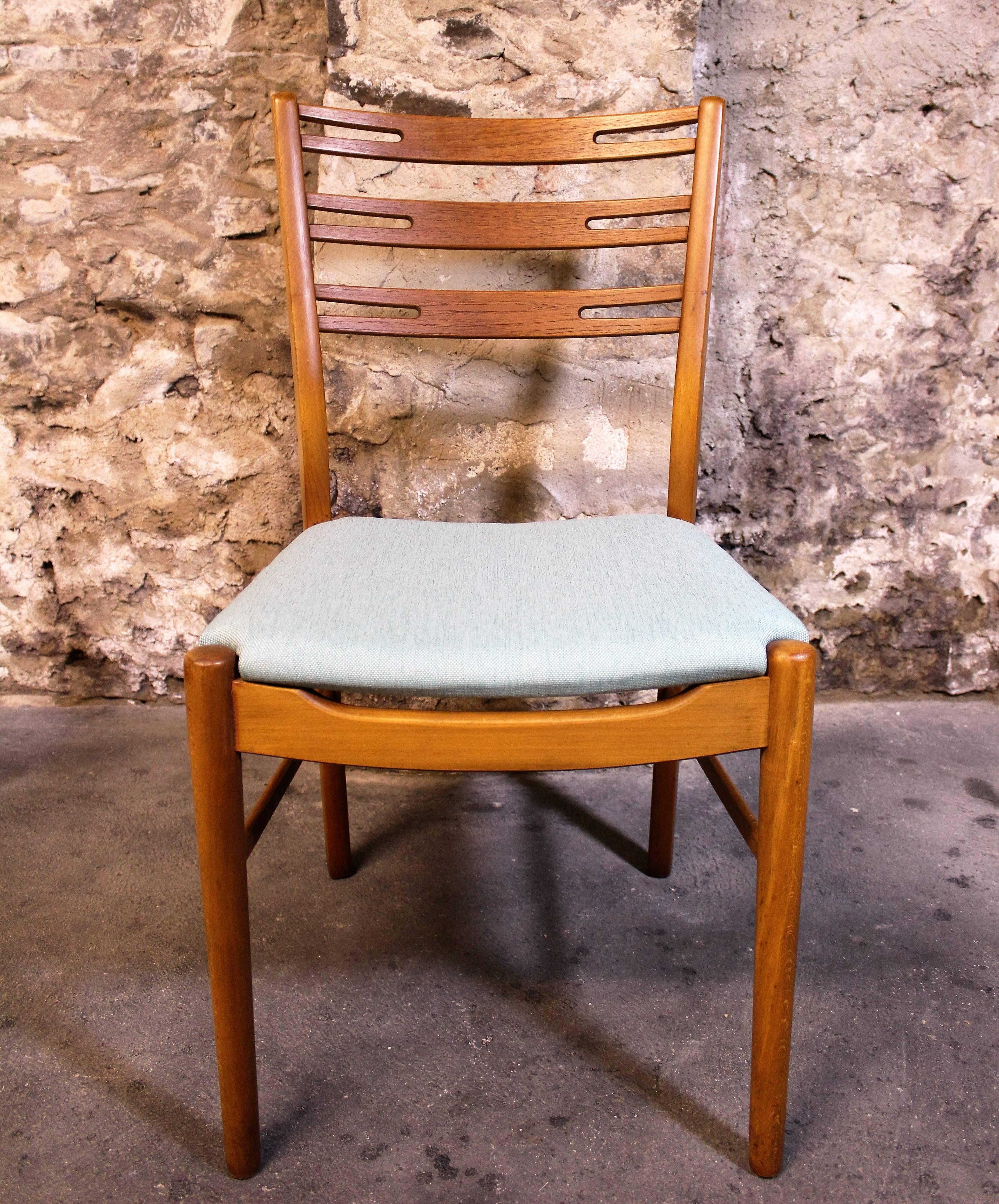 Set of six 'Farstrup' chairs with teak and walnut frames. Newly upholstered in light teal blue fabric.

Mid-Century Modern / Scandinavian Modern