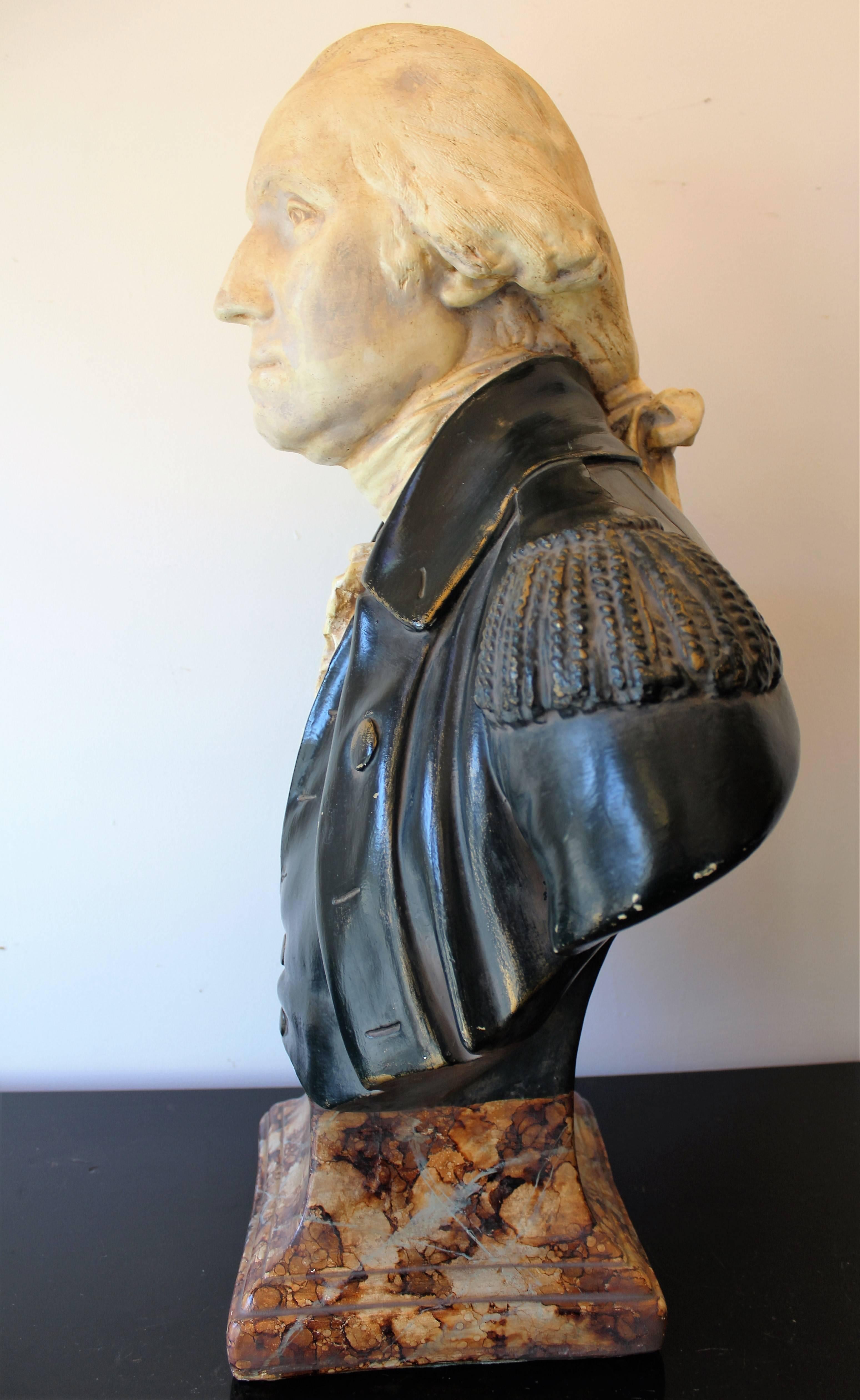 19th century plaster bust of George Washington after French sculptor Jean-Antoine Houdon. The original sculpture from the late 18th century was based on a life mask and other measurements of George Washington taken by Houdon. It is considered one of