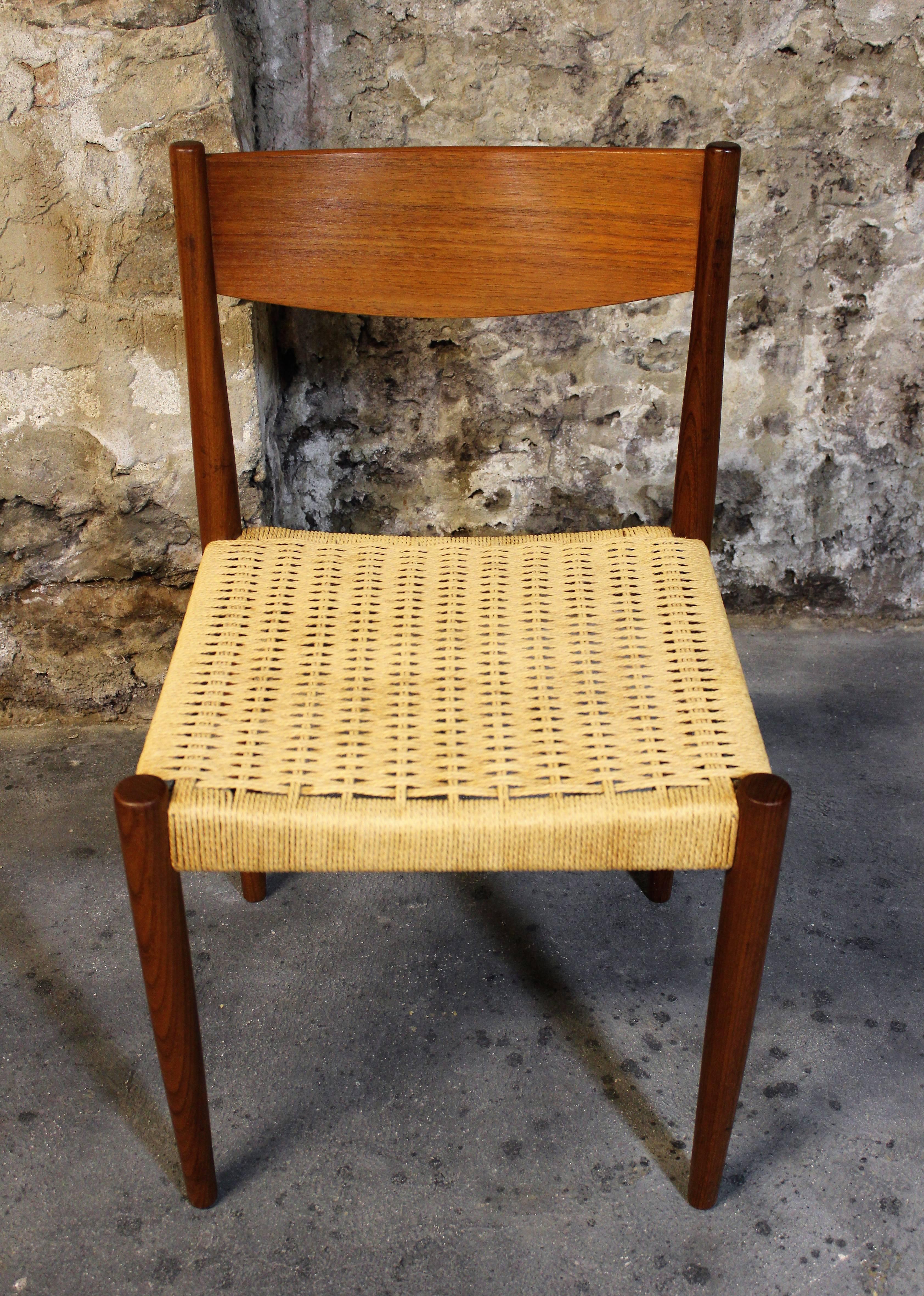 Four Poul Volther for Frem Rojle Danish teak woven cord dining chairs. We also have an additional four of these same chairs finished in fabric and not rope.

Mid-Century Modern / Scandinavian Modern