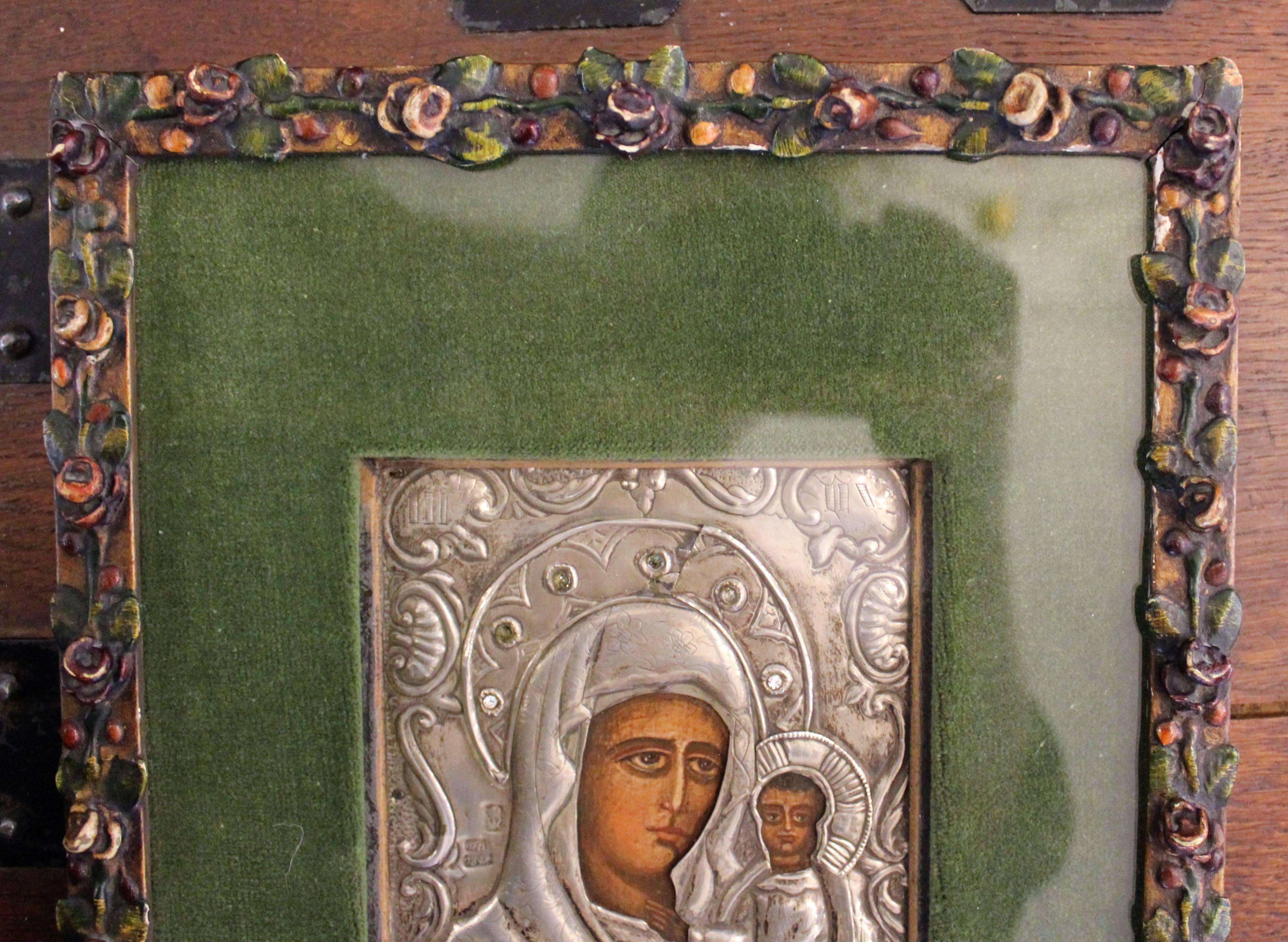 19th century Russian painting of the Virgin Mary and Jesus Christ with finely detailed, hand-hammered and silver hallmarked oklad embellished with semi-precious stones.
Size:
Without Frame: 5.75