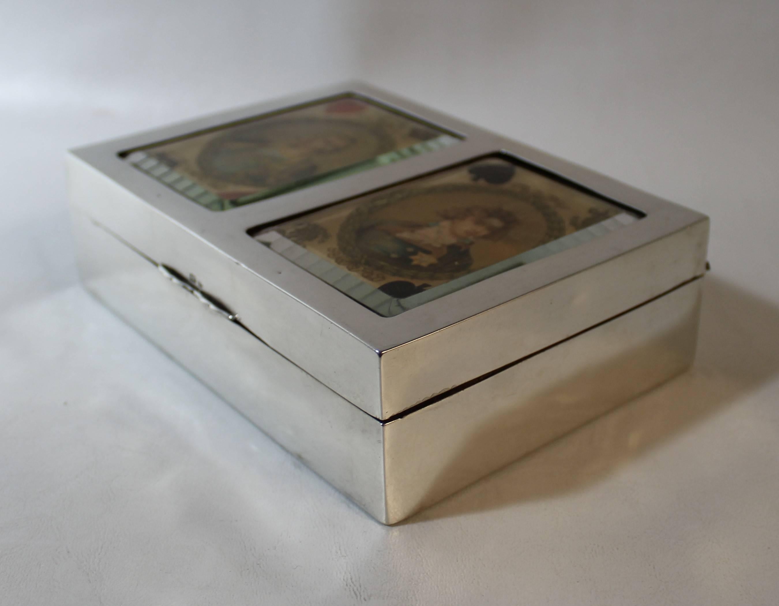 Sterling silver playing card box made by Walter H. Wilson of Birmingham England in 1901. 

      