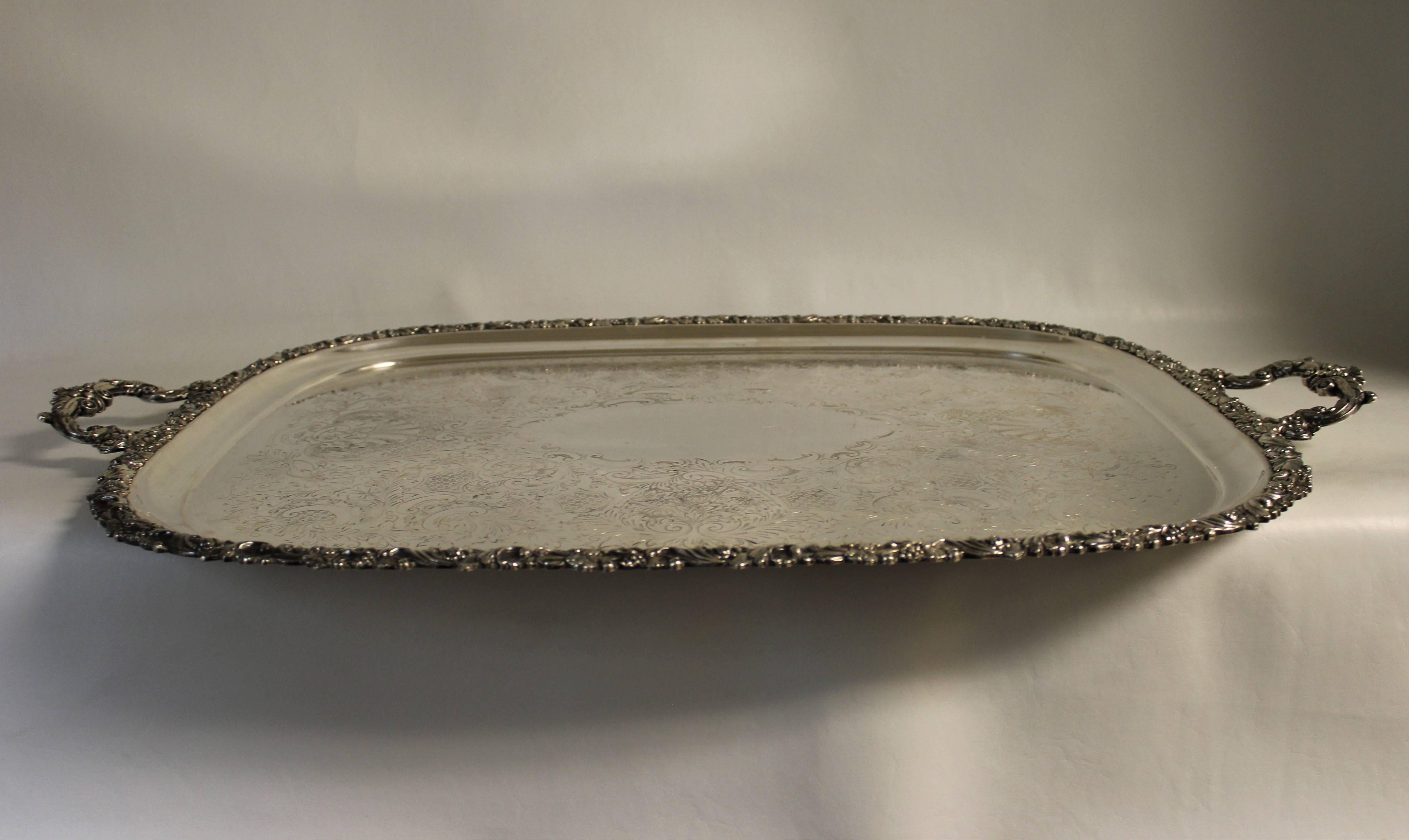 English Ellis-Barker silver plated tray with grapevine motif; reticulated border, chased and engraved surface with scrolling foliate and floral design.