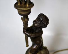 Pair of French Bronze, Marble and Ormolu Lamps with Figural Satyr and Cherub