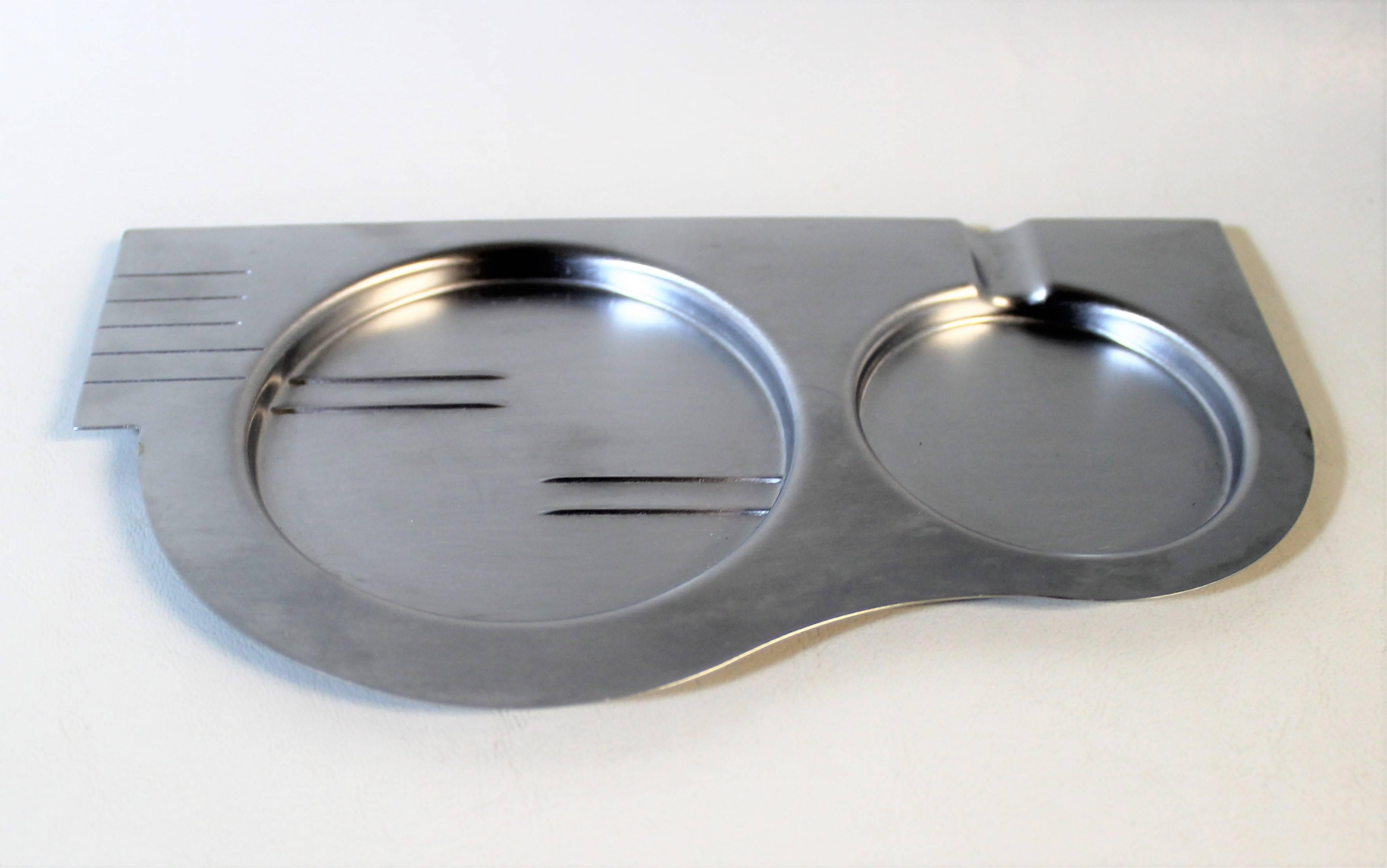Set of four Art Deco ashtrays by Revere Copper and Brass, Inc in original box.