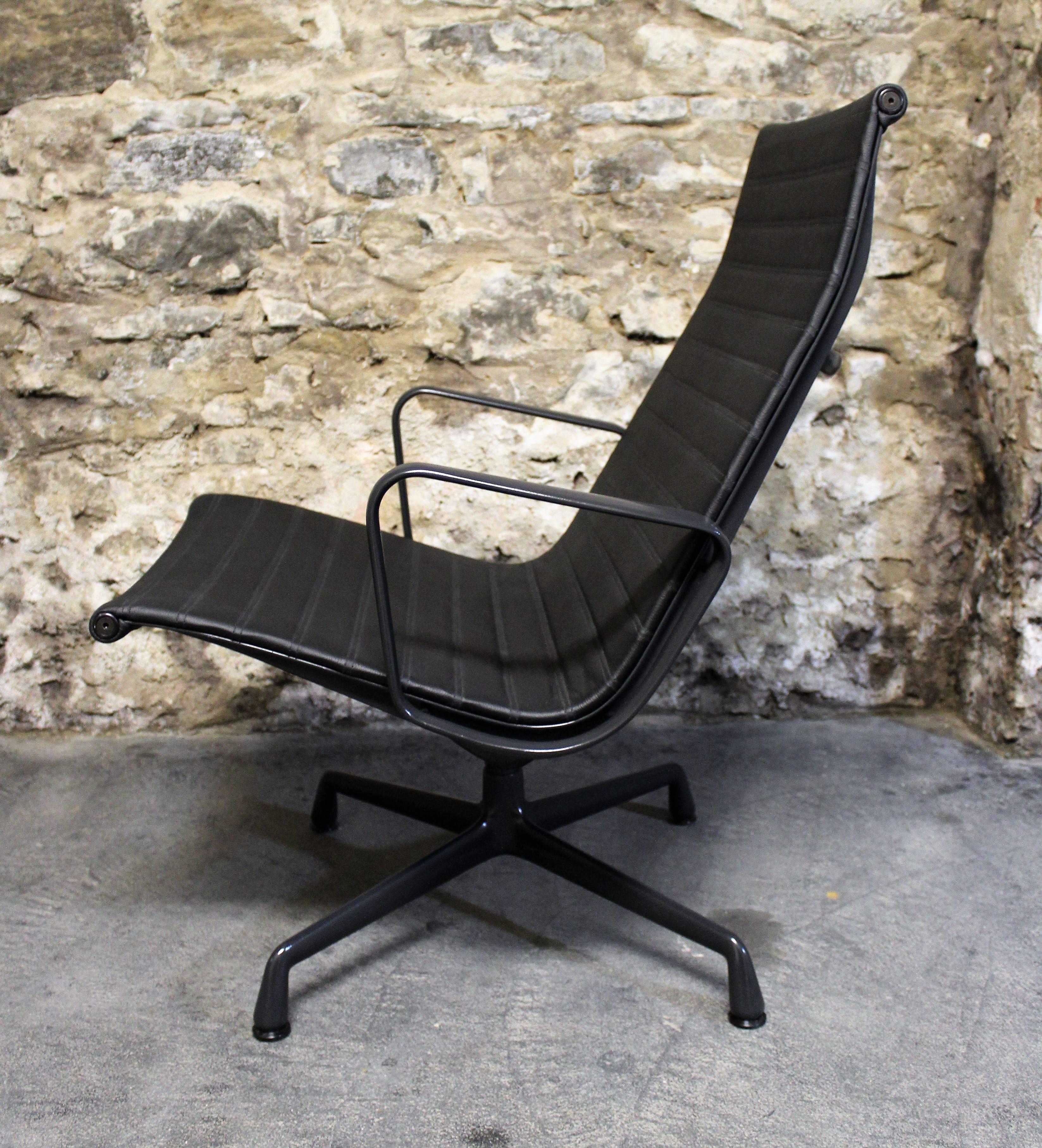 American Mid-Century Classic swivel lounge chair designed by Charles & Ray Eames for Herman Miller. This has been completely restored and re-upholstered in black leather.