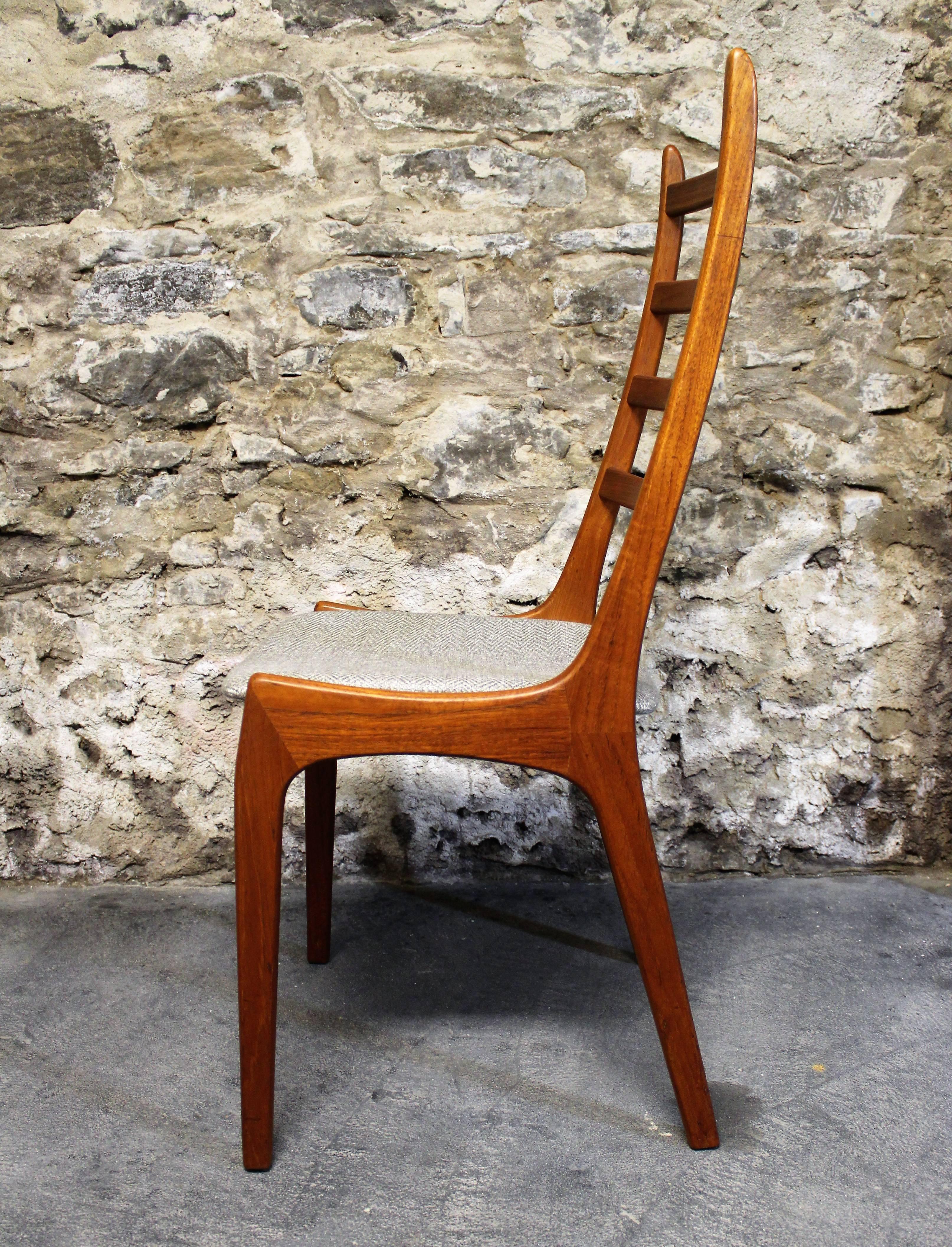 Set of six teak ladder back dining room chairs by Kai Kristiansen for Korup Stolefabrik. The high backrests are constructed from teak and curved into a gradually tapered ladder back. Interestingly, the chair was designed with a unique three-way