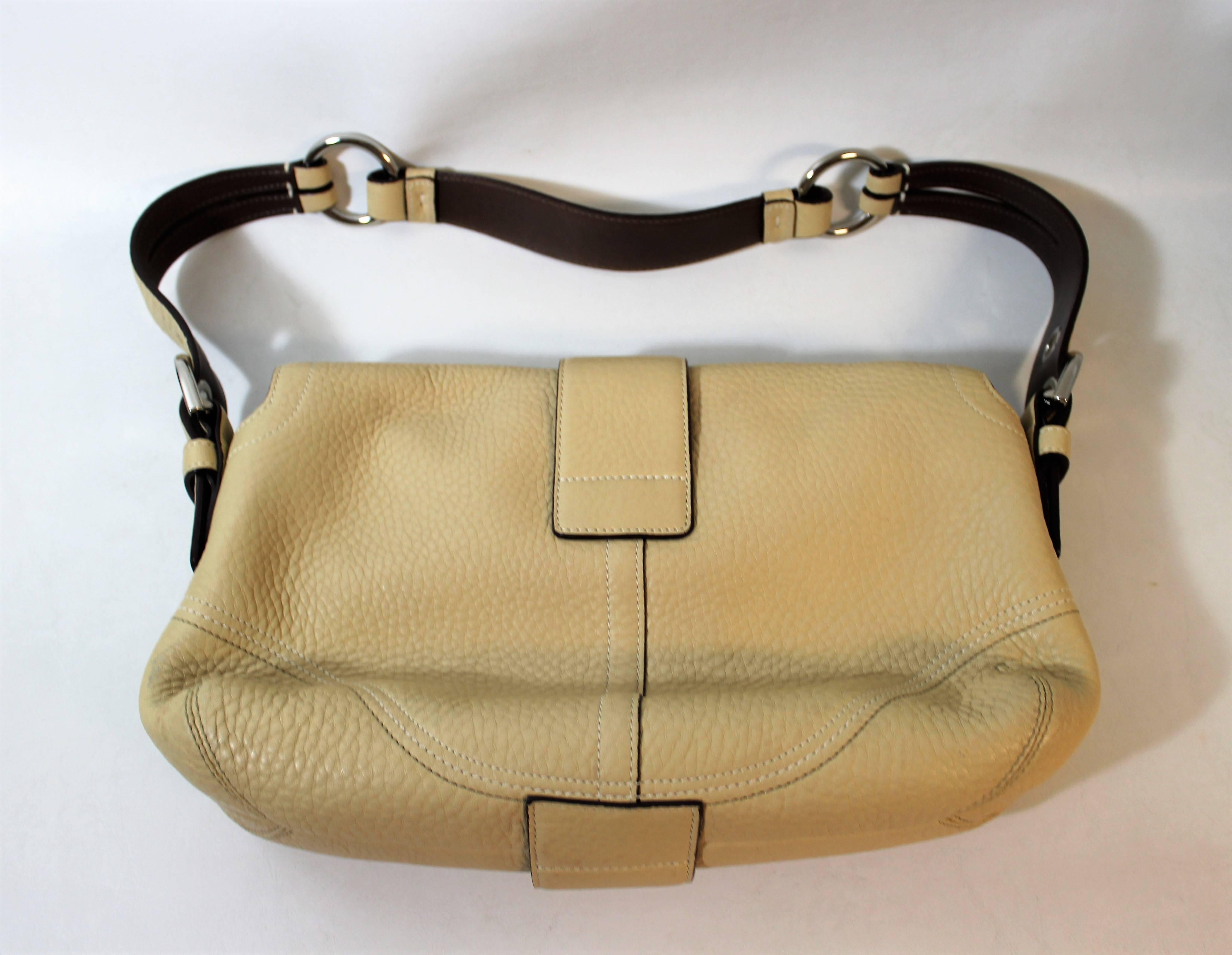 Leather Coach handbag or purse.