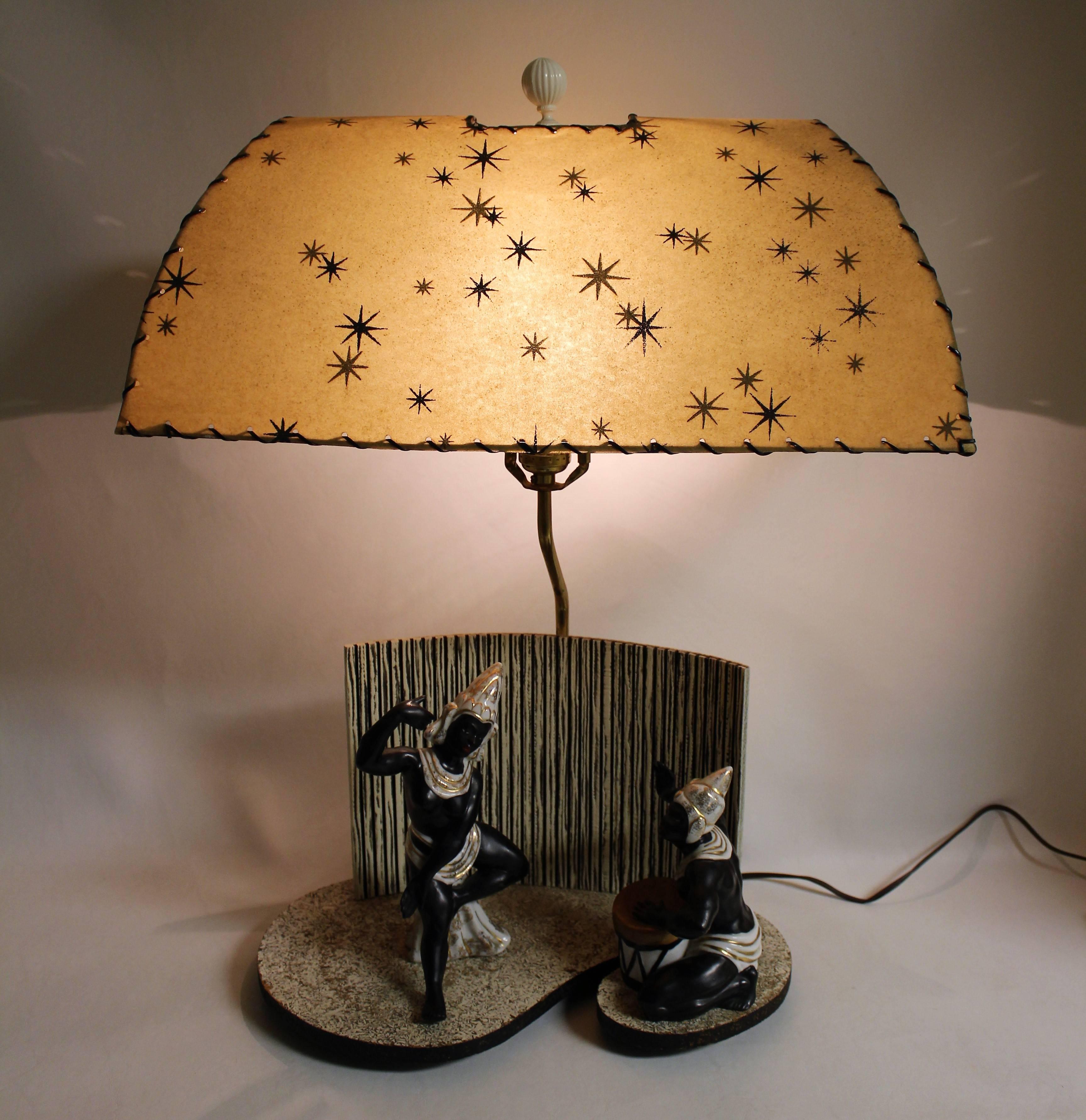 Mid-Century Modern figural ceramic lamp with South Asian theme.