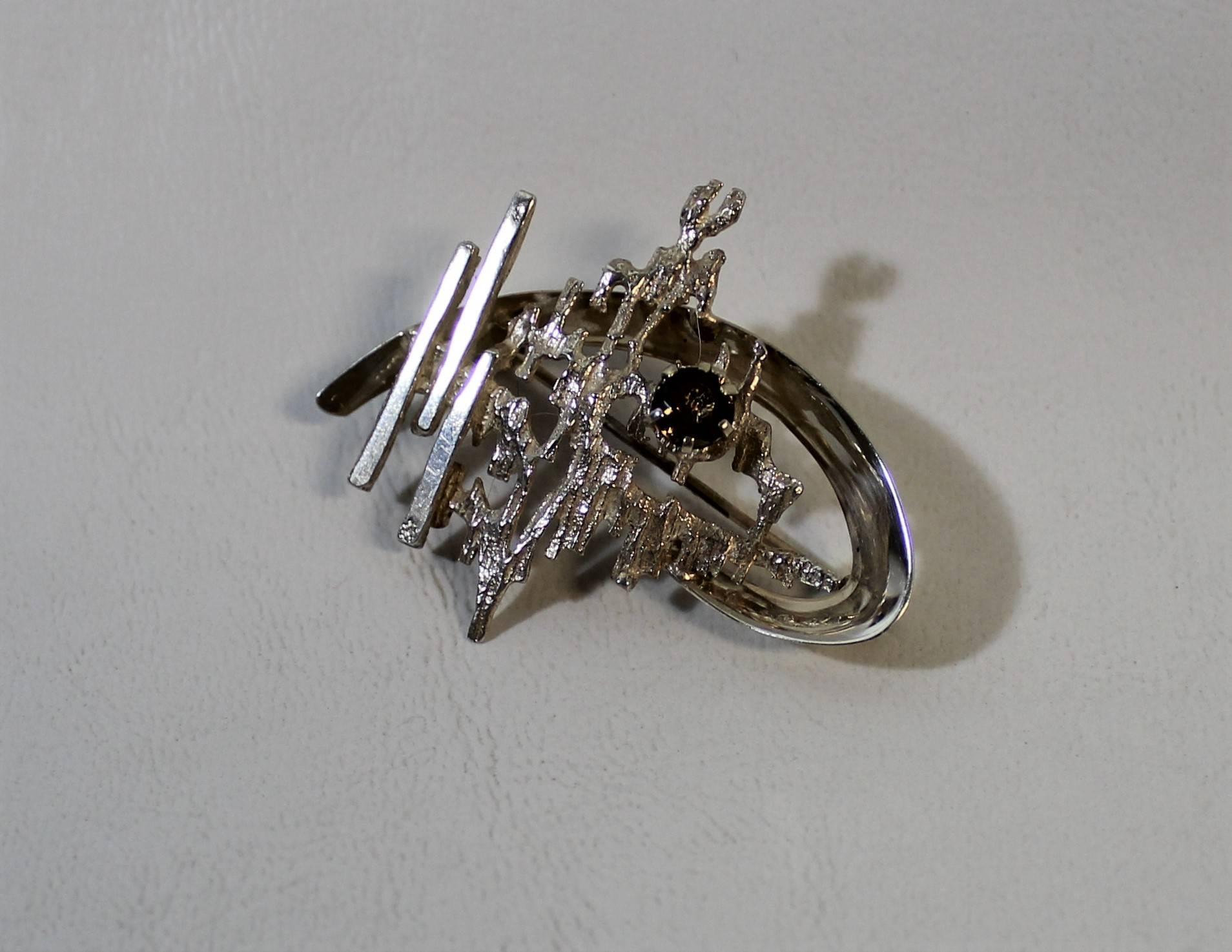 Brutalist Scandinavian (Finland) 830 silver brooch pin with smoky quartz

Scandinavian Modern / Mid-Century Modern.