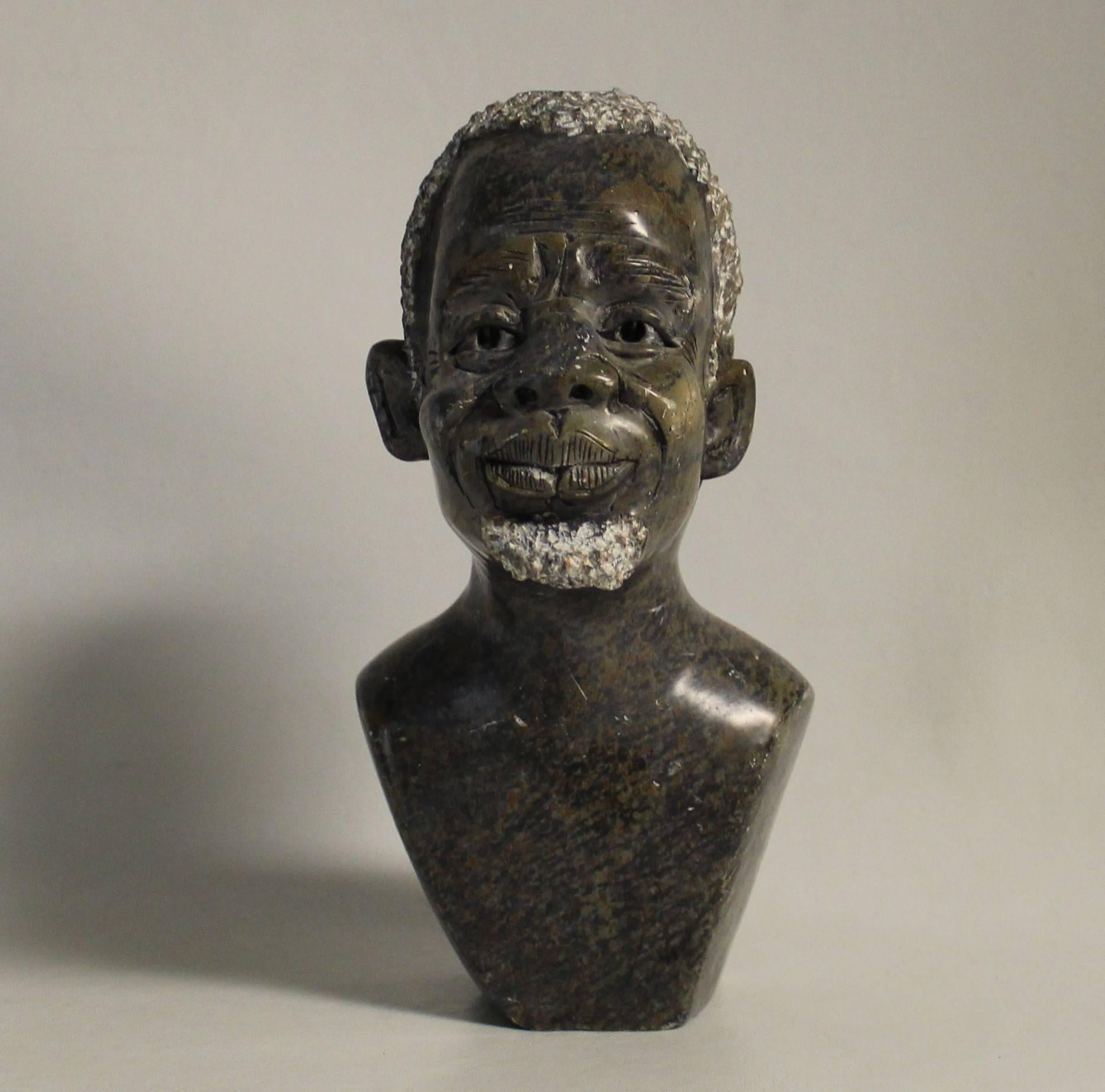 African Shona art sculpture from Zimbabwe's Shona tribe and carved from serpentine stone.