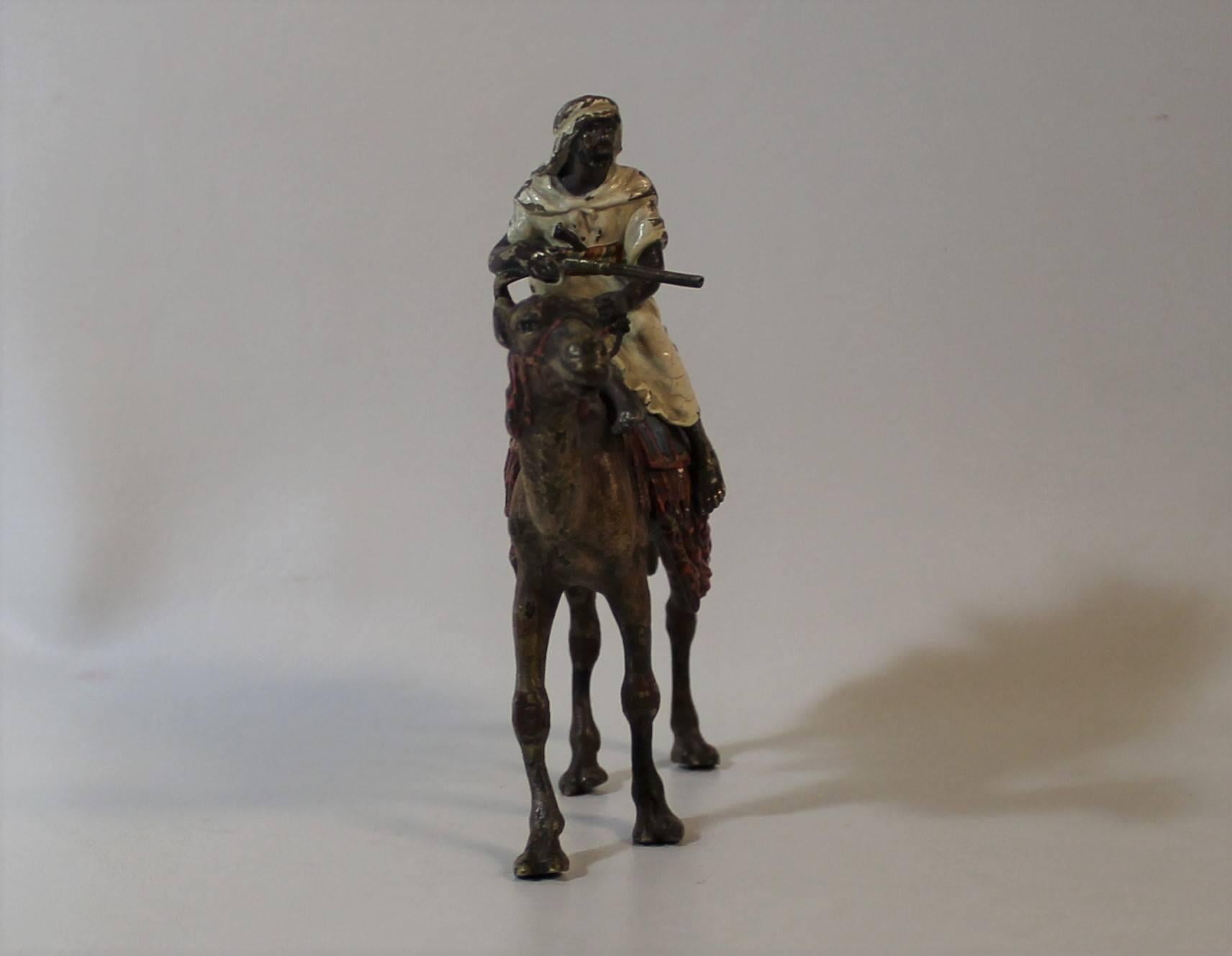 painted bronze sculpture