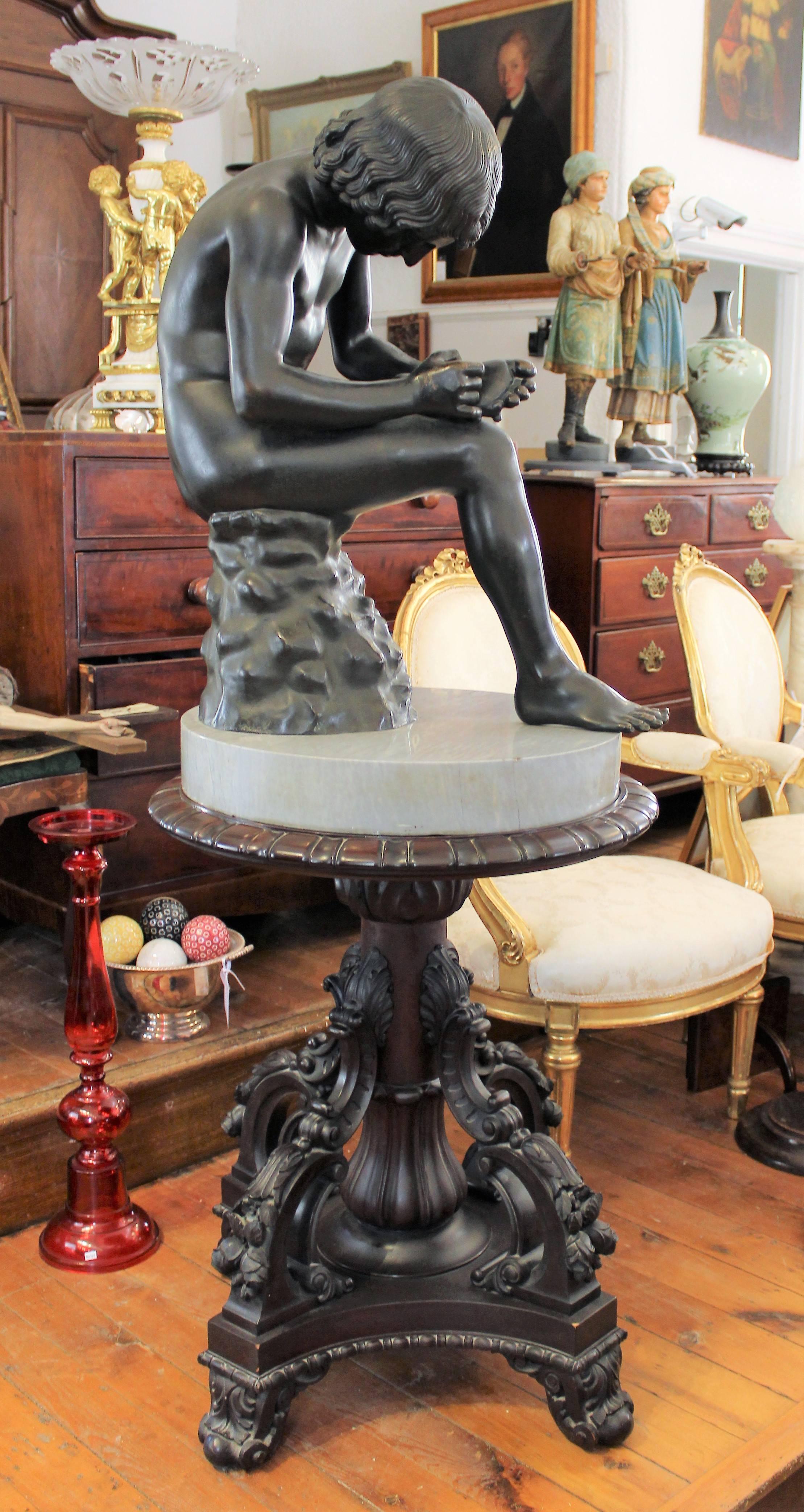 Large 19th century Italian 'Spinario' bronze sculpture on stand. This is a 19th century copy and the original is in the Capitaline Museum.