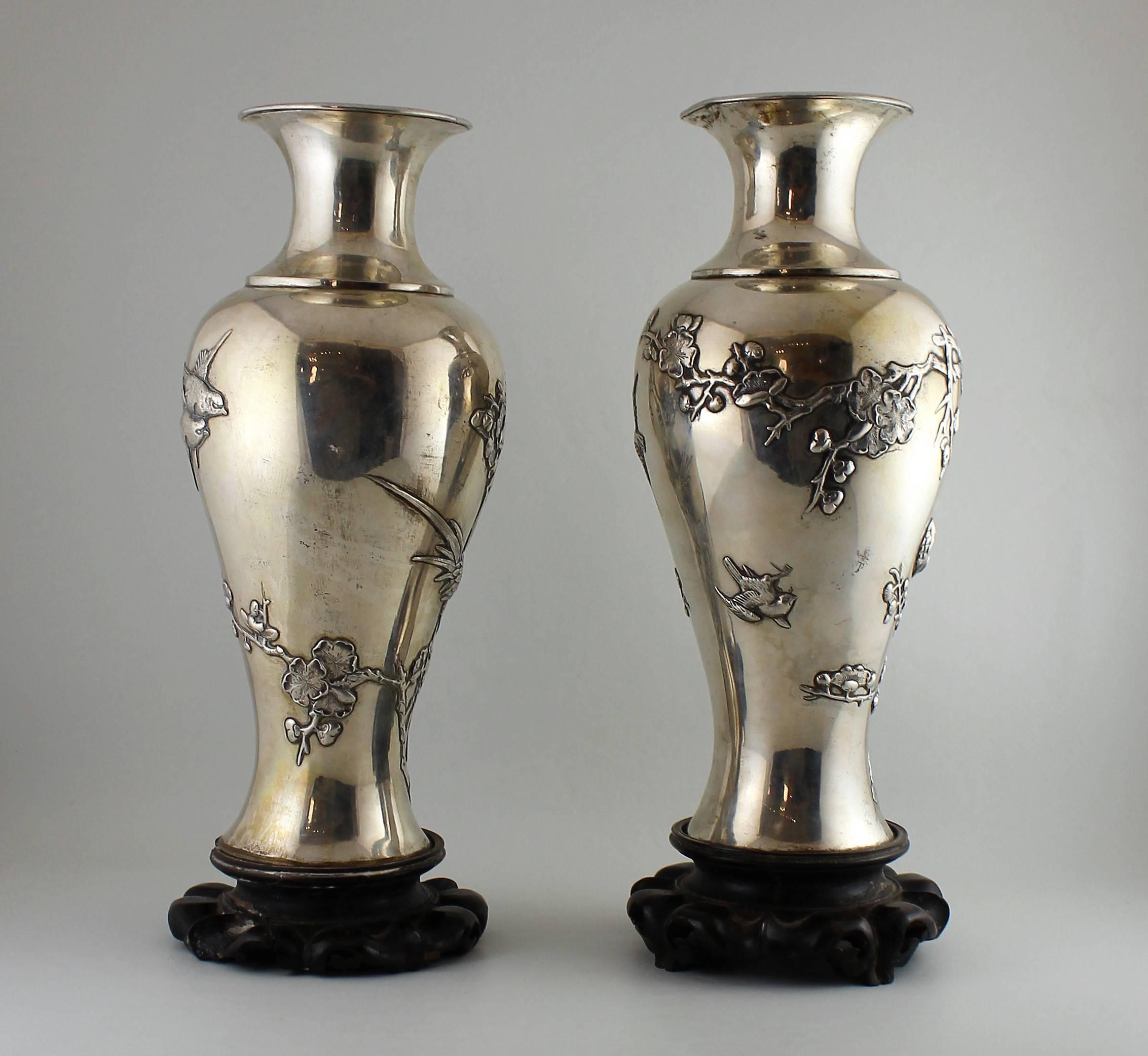 Pair of 19th century Chinese Pao Kuang 'Canton' silver vases.