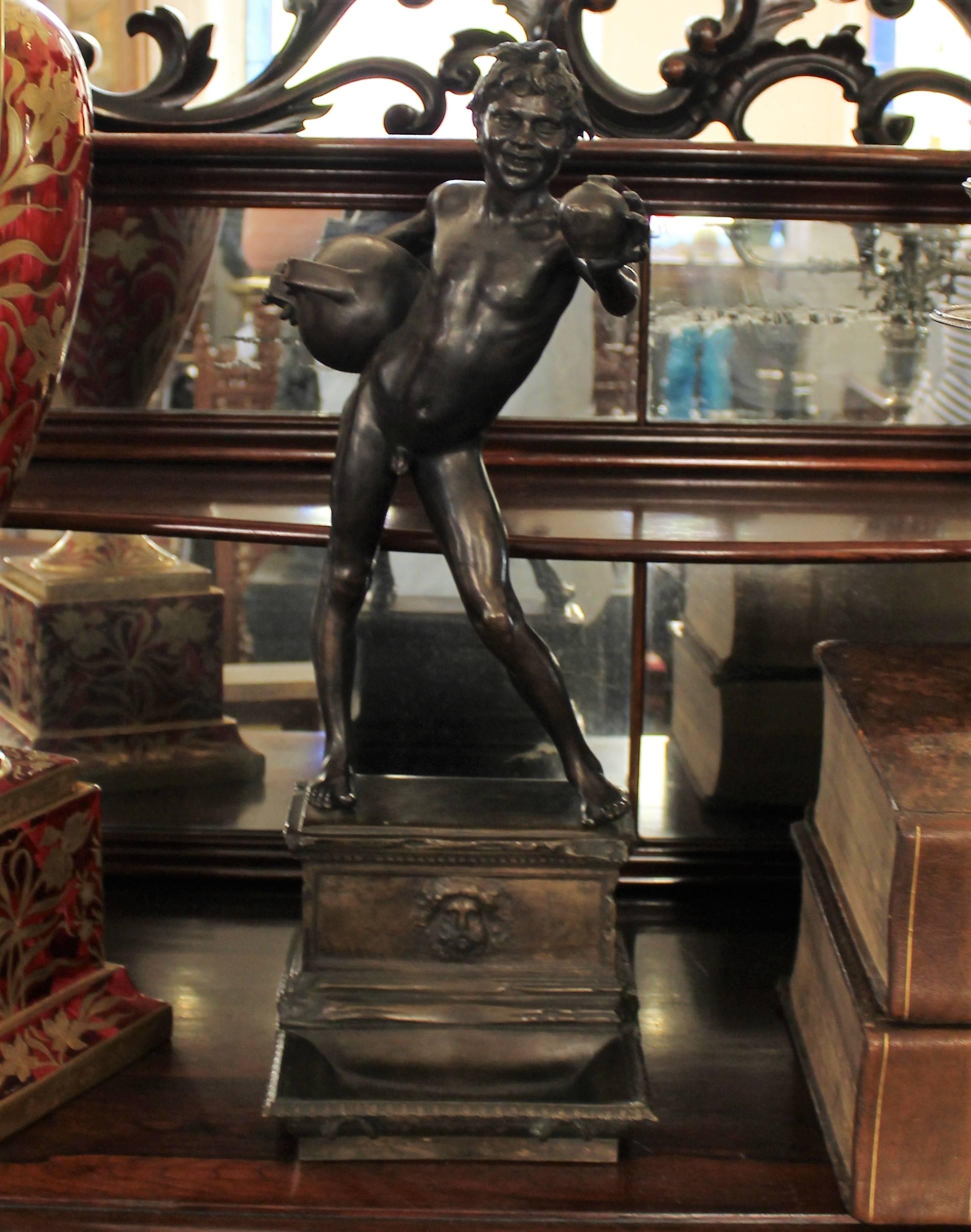 Italian bronze 'L'Acquaiolo' Sculpture after Vincenzo Gemito (Italian, 1852-1929) 

L'Acquaiolo, the bronze cast as a nude boy with a jug propped on his hip and offering a drink of water, over a Neoclassical fountain, dark brown/black patina,