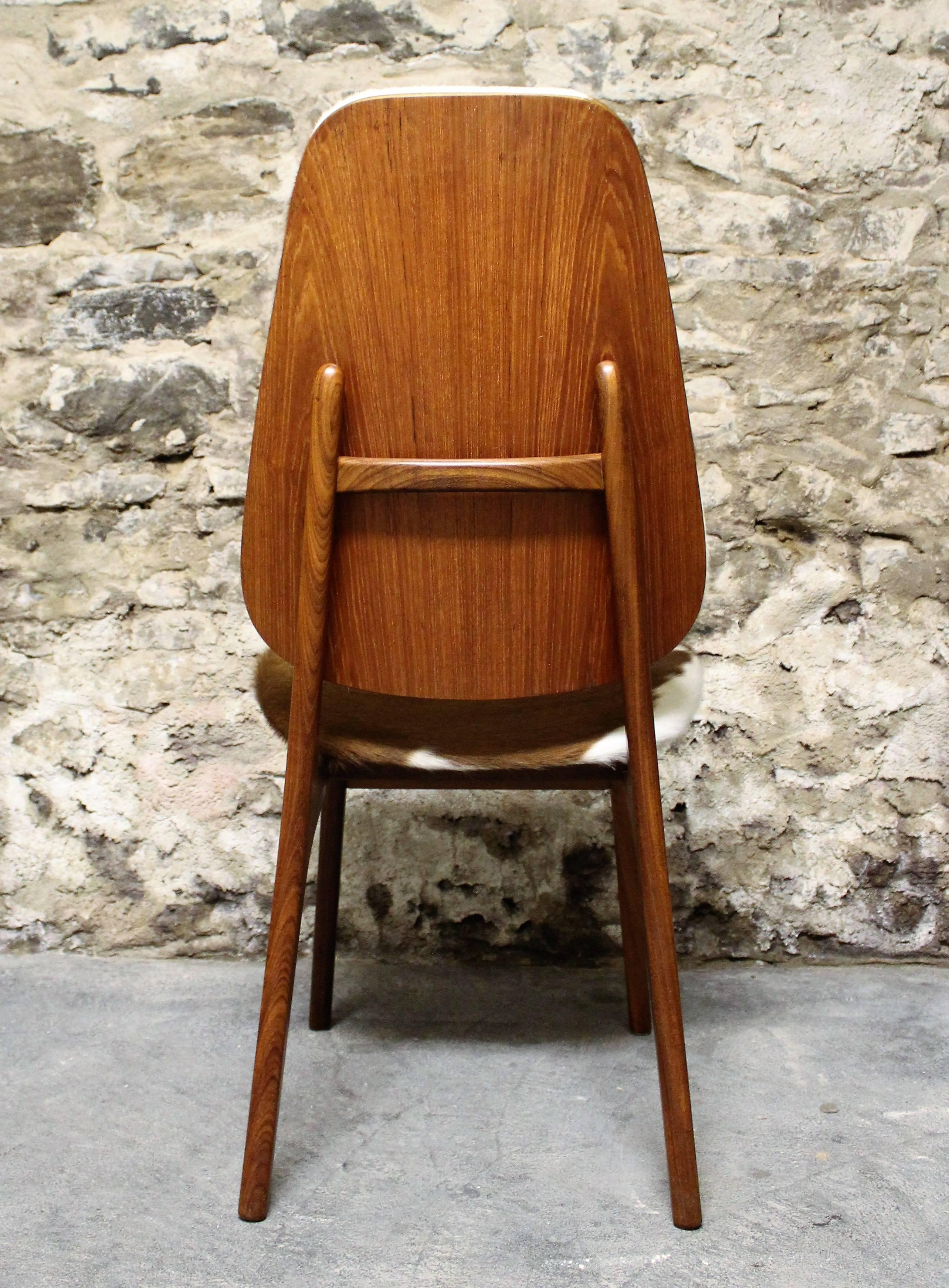 Four Arne Hovmand Olsen Danish Teak Dining Chairs with Cowhide Upholstery 1
