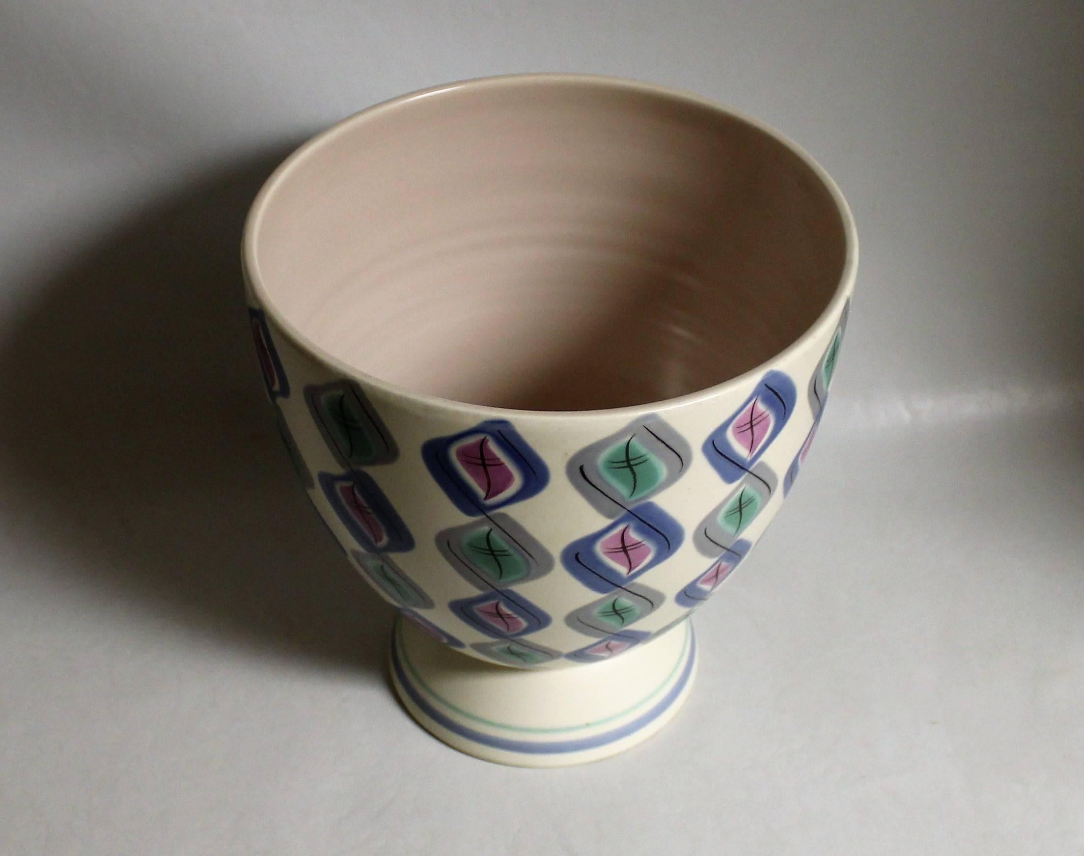 Ruth Pavely Mid-Century Modern free-form Poole Pottery vase in Harlequein pattern.