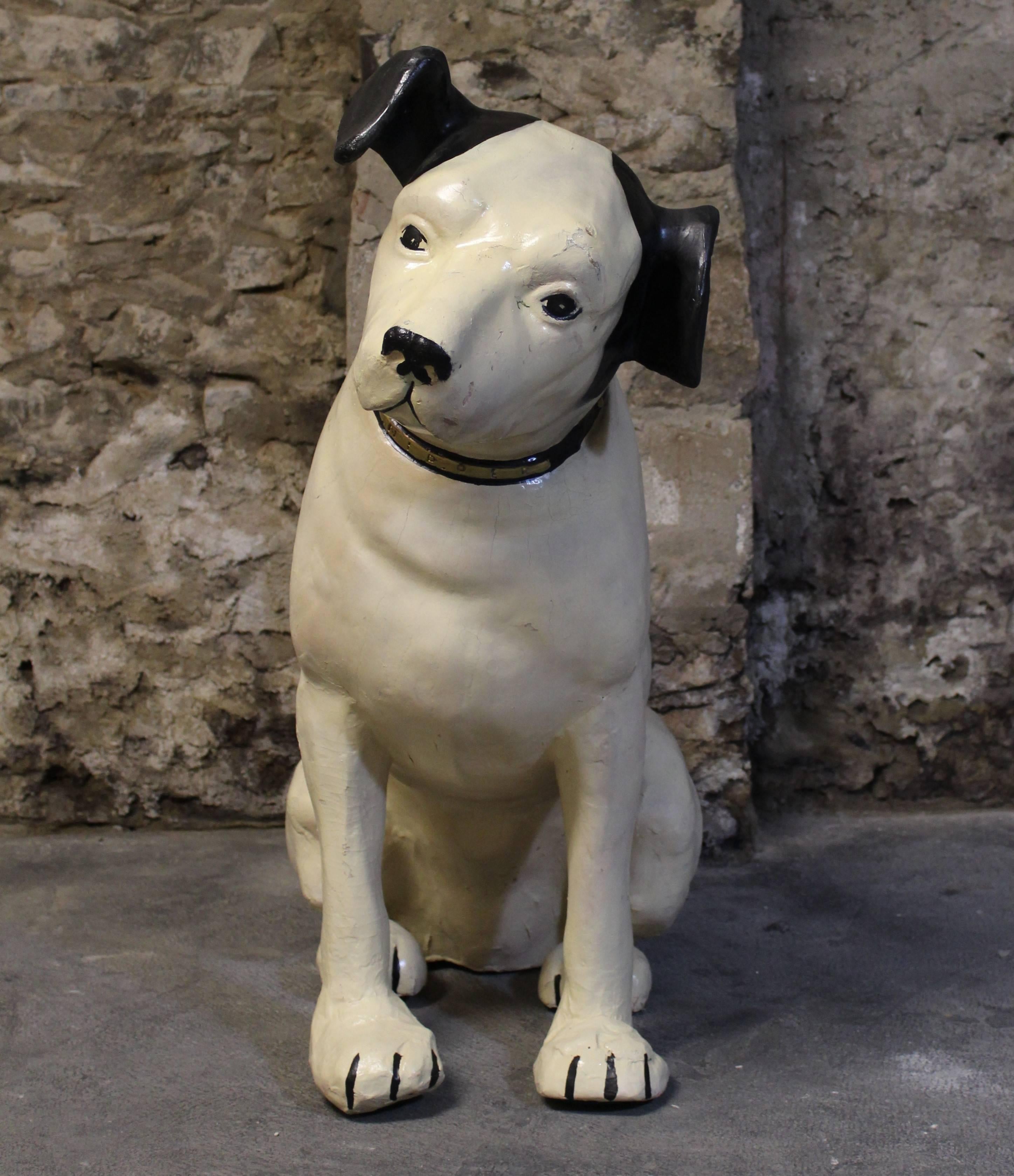 His Masters voice large store display 'Nipper' Dog by Old King Cole Papier-Mache Company of Canton, Ohio.
His Master's Voice (HMV) is a famous trademark in the music and recording industry and was the unofficial name of a major British record label.