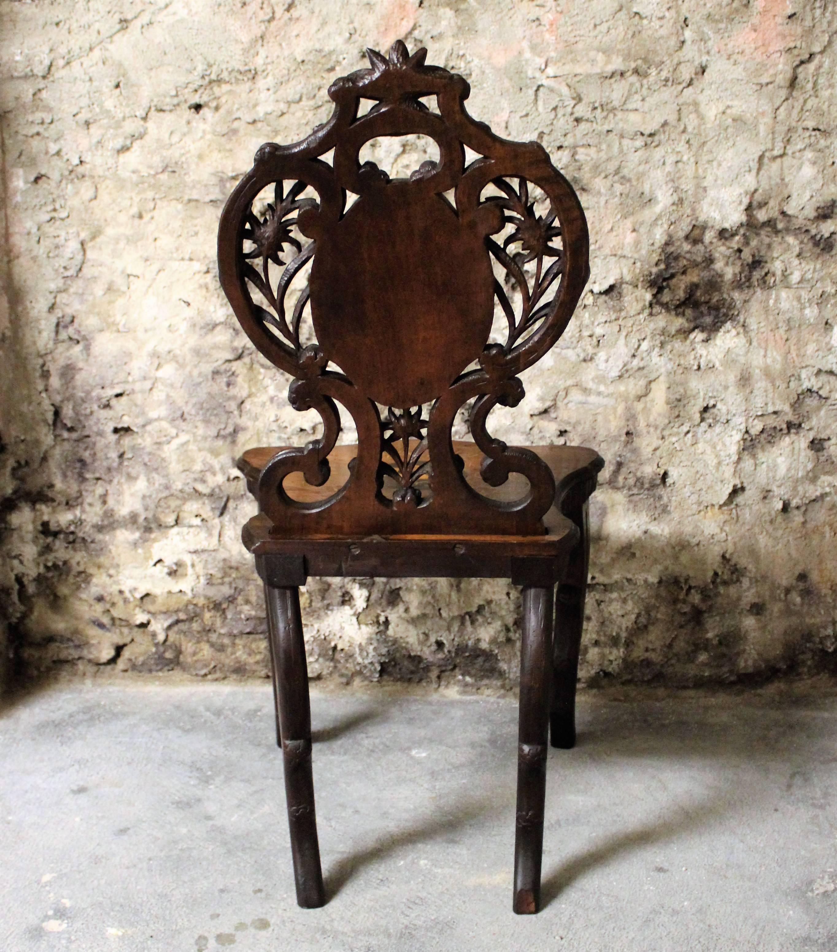 19th Century Black Forest Carved Chair with Inlay 2