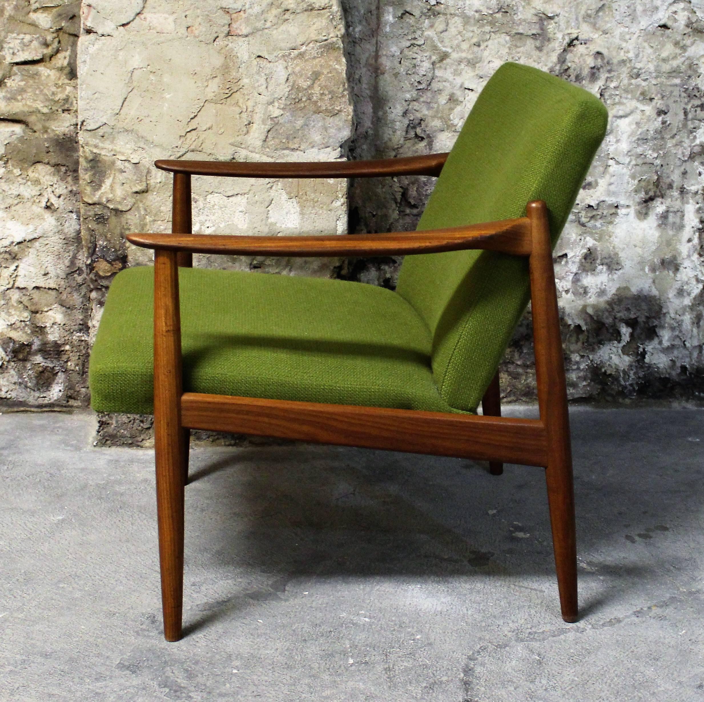 Mid-Century Modern teak lounge chair with original upholstery.