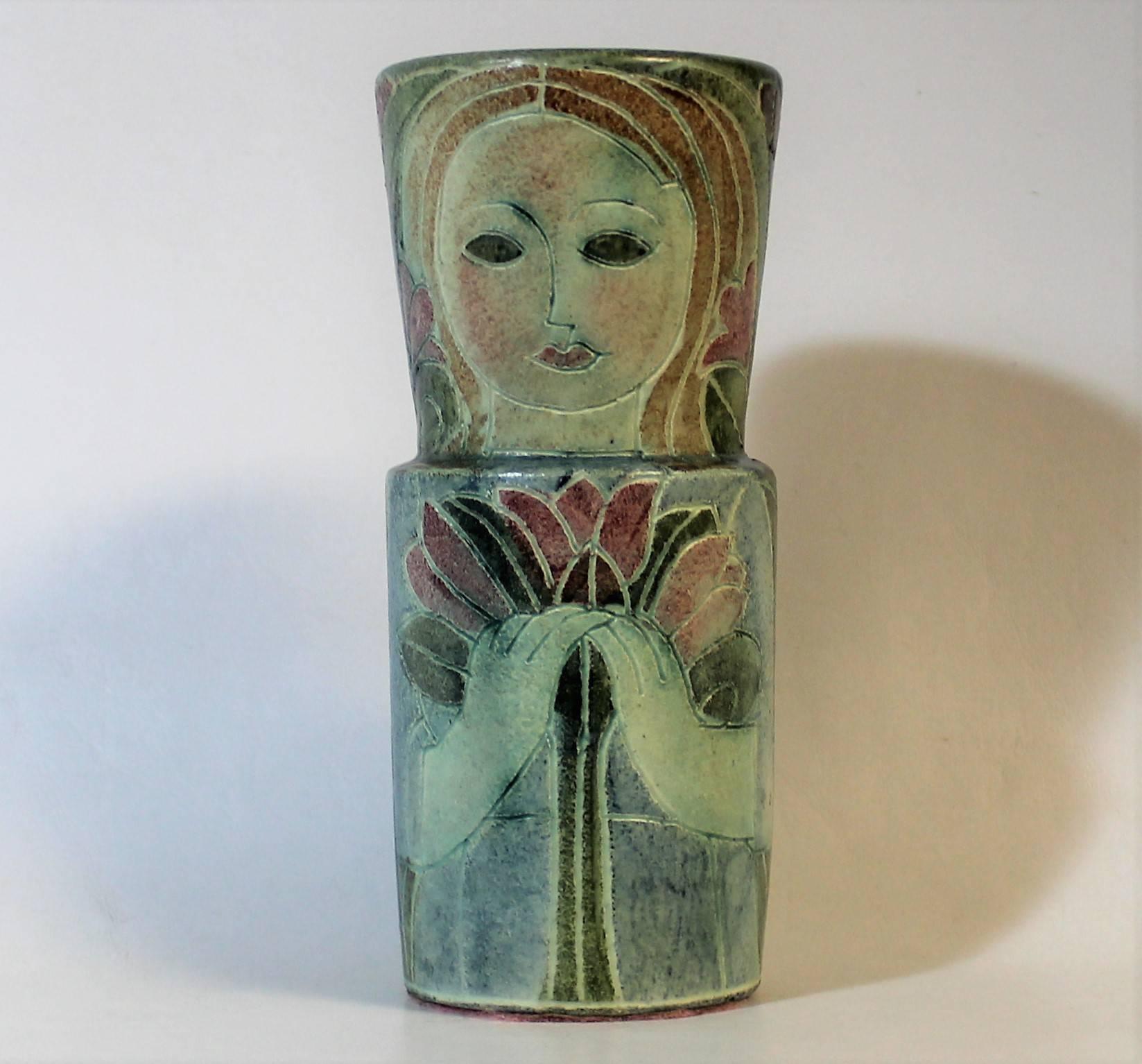 Studio pottery Mid-Century Modern vase by Theo and Susan Harlander of Brooklin Pottery, Brooklin, Ontario. This vase was designed with a whimsical cubist flare and done in rich colors with a matte glaze finish. It features two female sgraffito