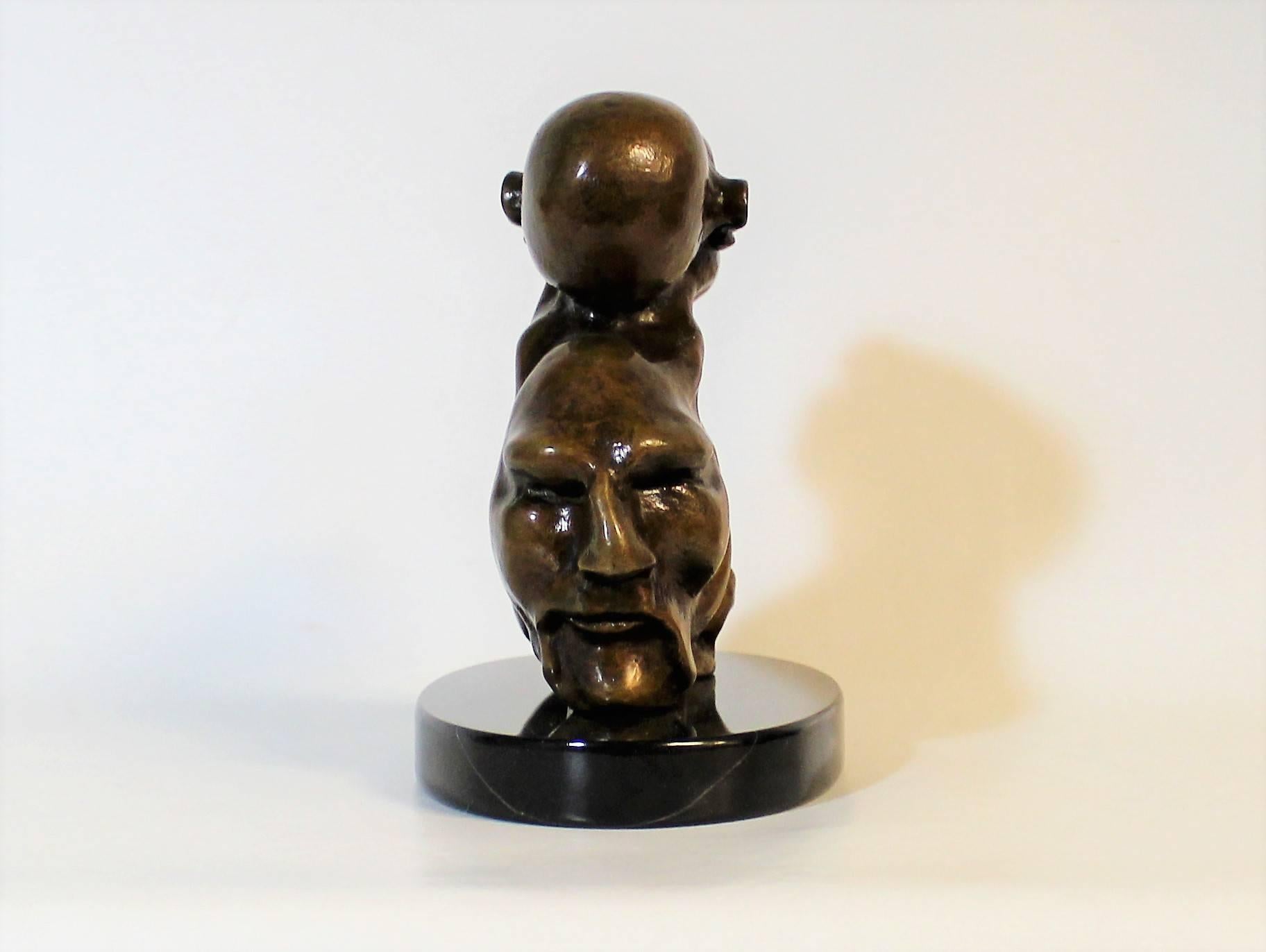 Bronze Sculpture of Three Morphing Faces 3