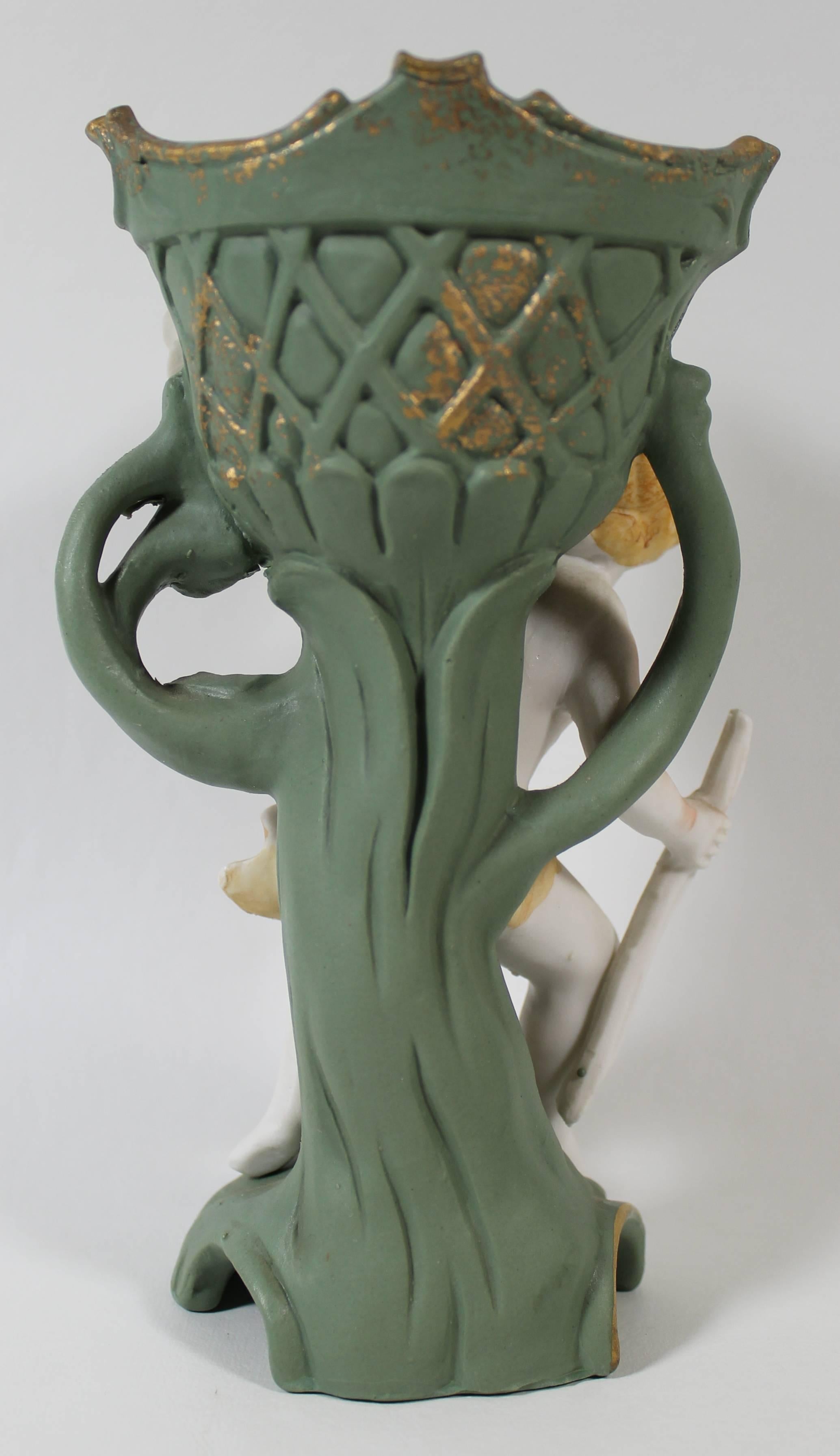 'Camille Naudot' Porcelain Figural Cherub Vase, French at 1stDibs