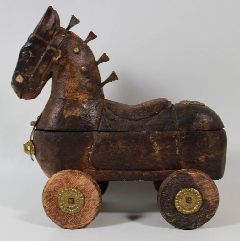 wooden horse on wheels