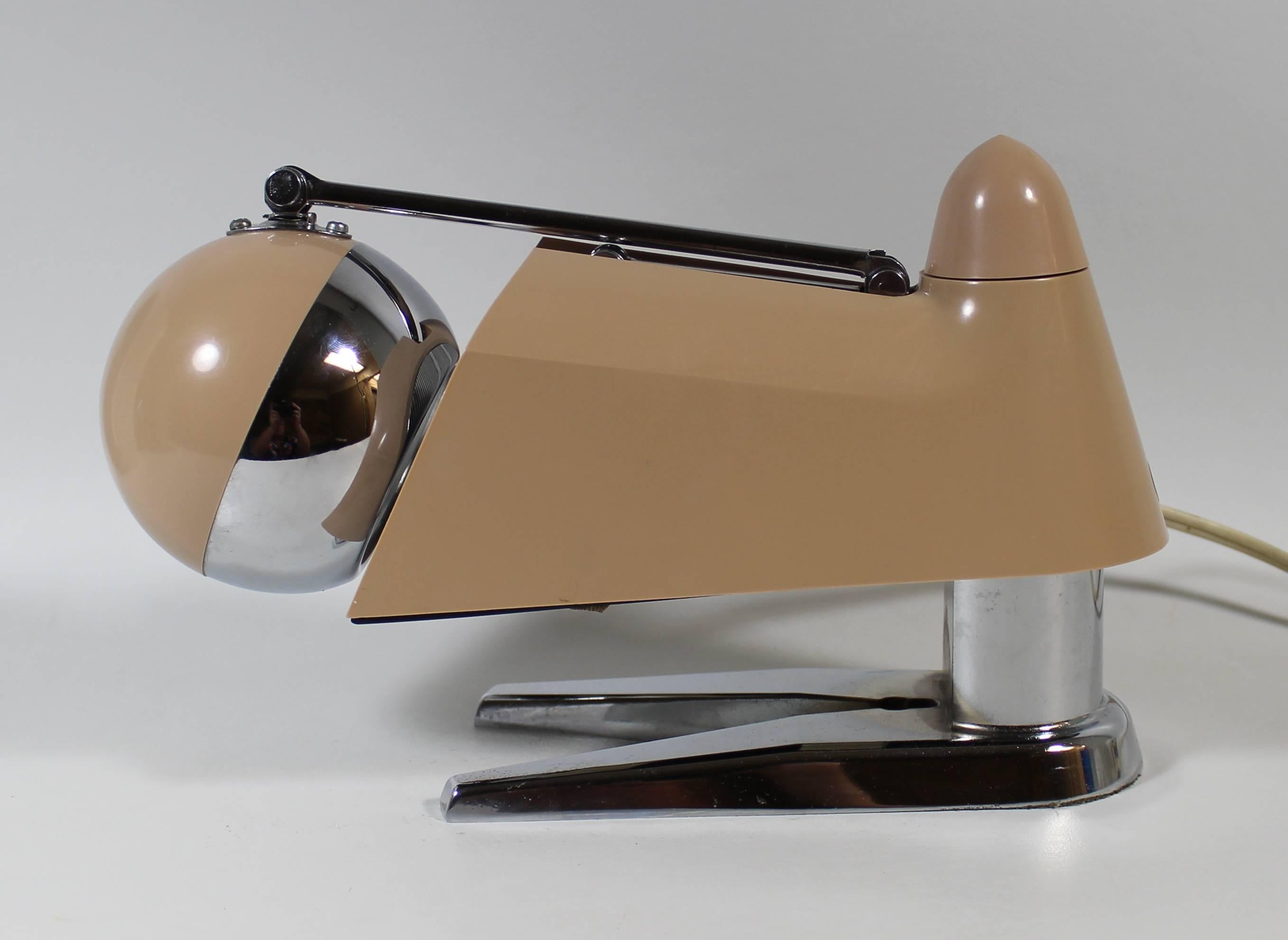 Space Age telescoping desk lamp

Hamilton Industries desk or table lamp. This adjustable lamp was made in Japan for Hamilton Industries, Chicago, Illinois. It has a hi and low option which controls the lights brightness. The arm telescopes