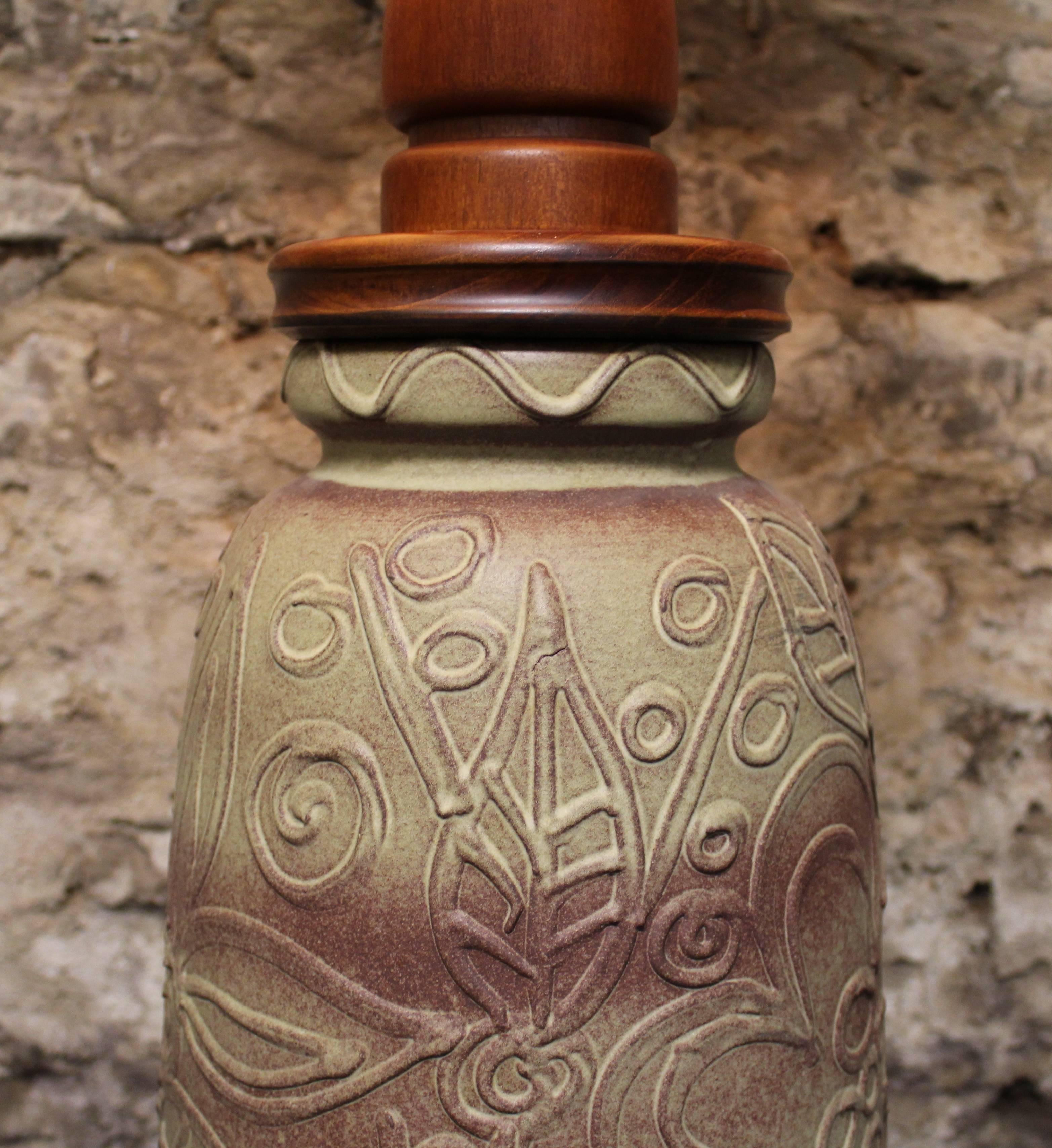 Teak art pottery lamp.