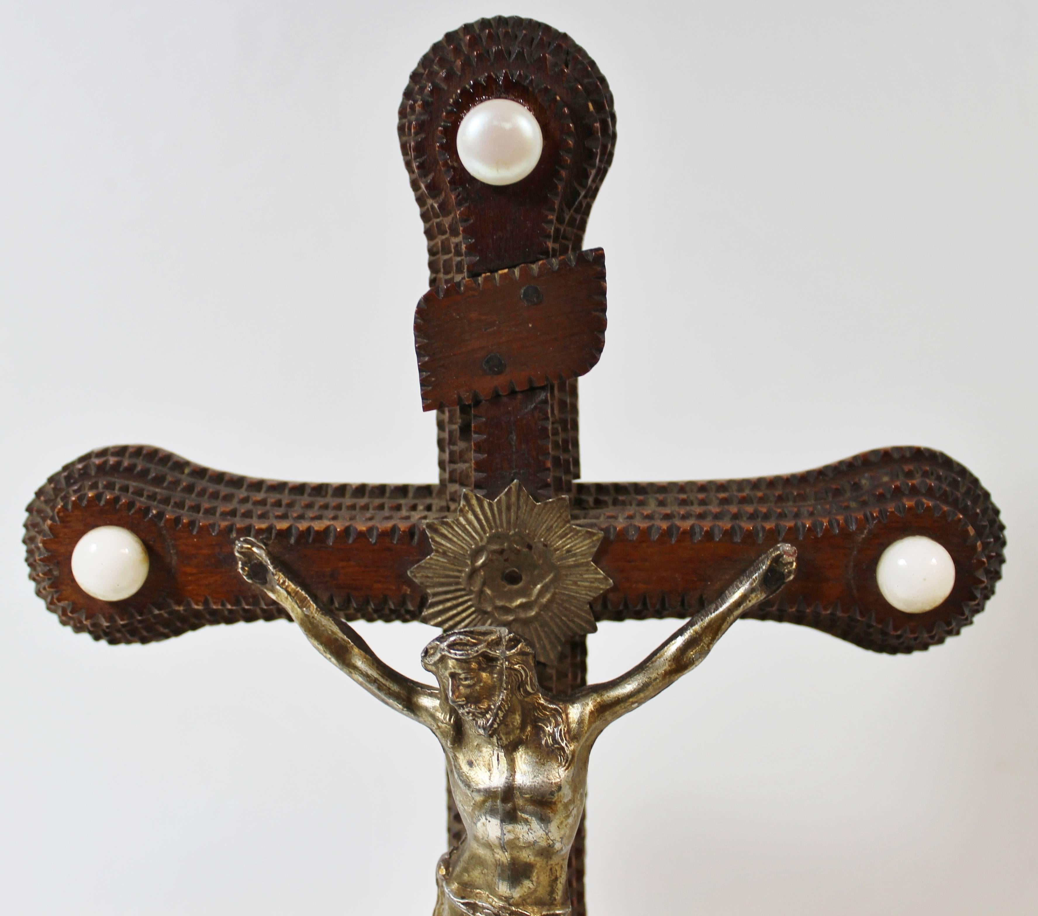 Tramp Art crucifix.

Free shipping within the United States and Canada.