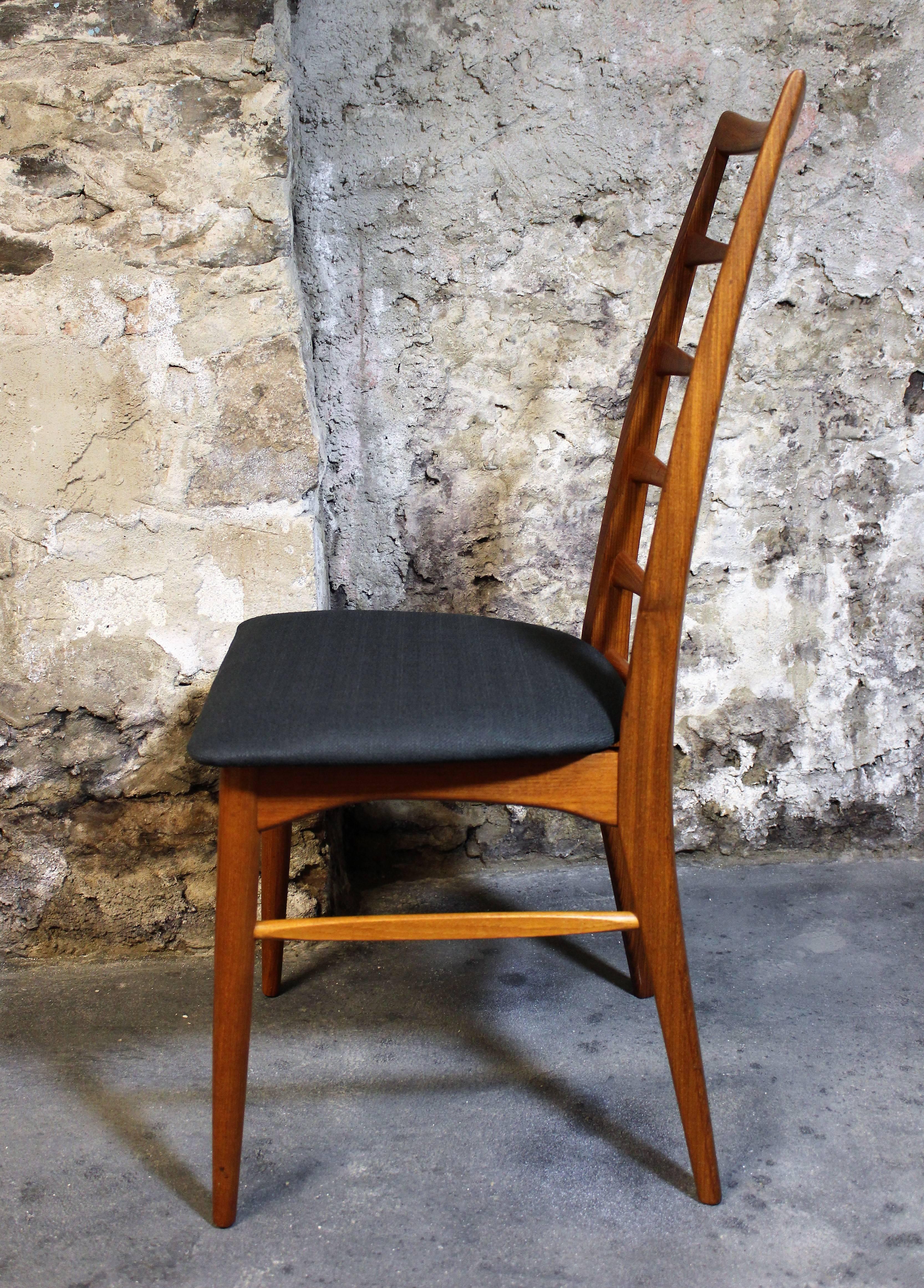 This set of four teak "Lis" ladder back chairs were designed by Neils Koefoed for Koefoeds Hornslet in Denmark. The chairs have been re-upholstered in black fabric.

Mid-Century Modern / Scandinavian Modern