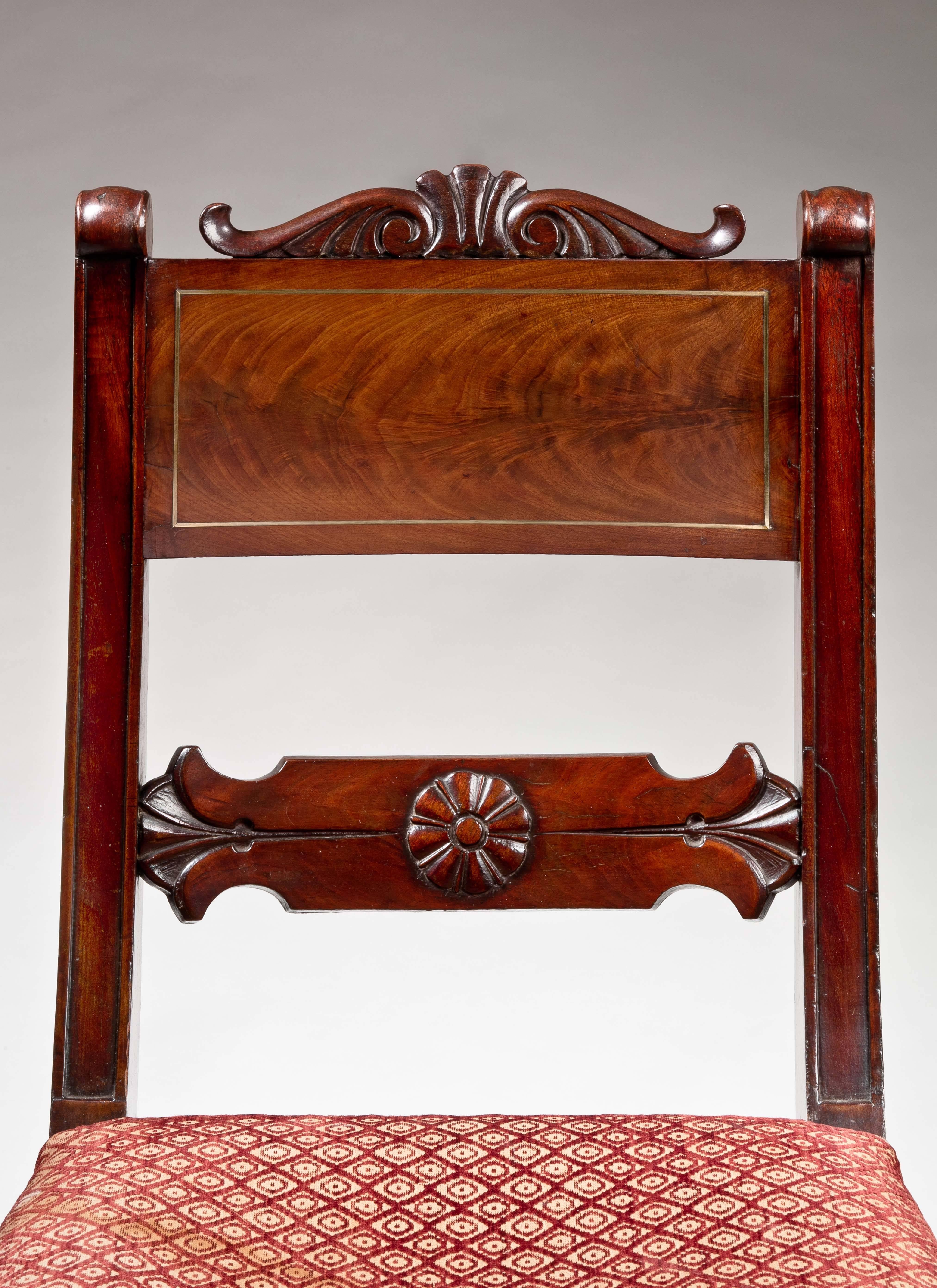 American Set of Four Brass-Inlaid Carved Mahogany Klismos Chairs