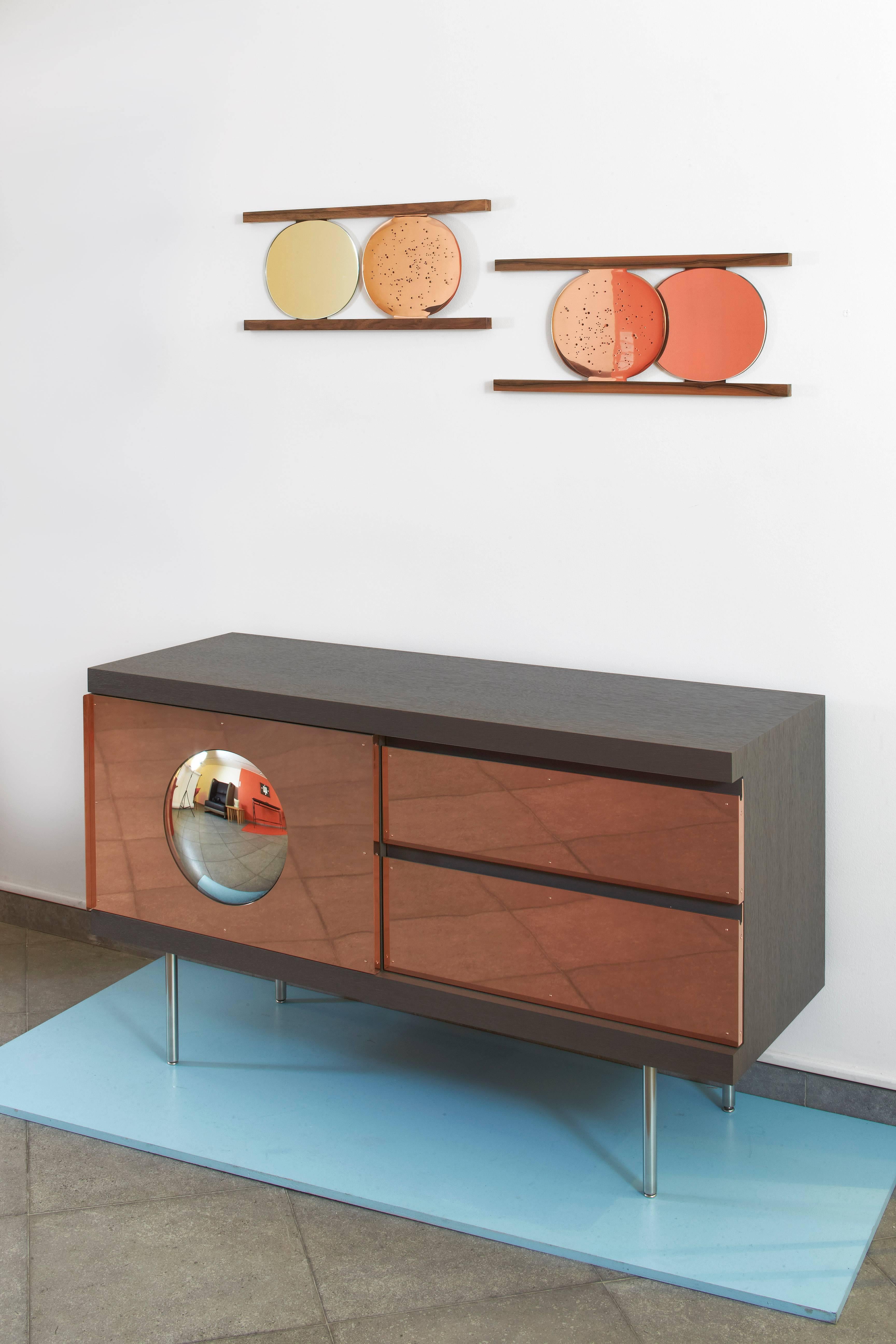 French Alice. Sideboard; brushed stained oak. Copper. Convex mirror. Patrick Naggar.
