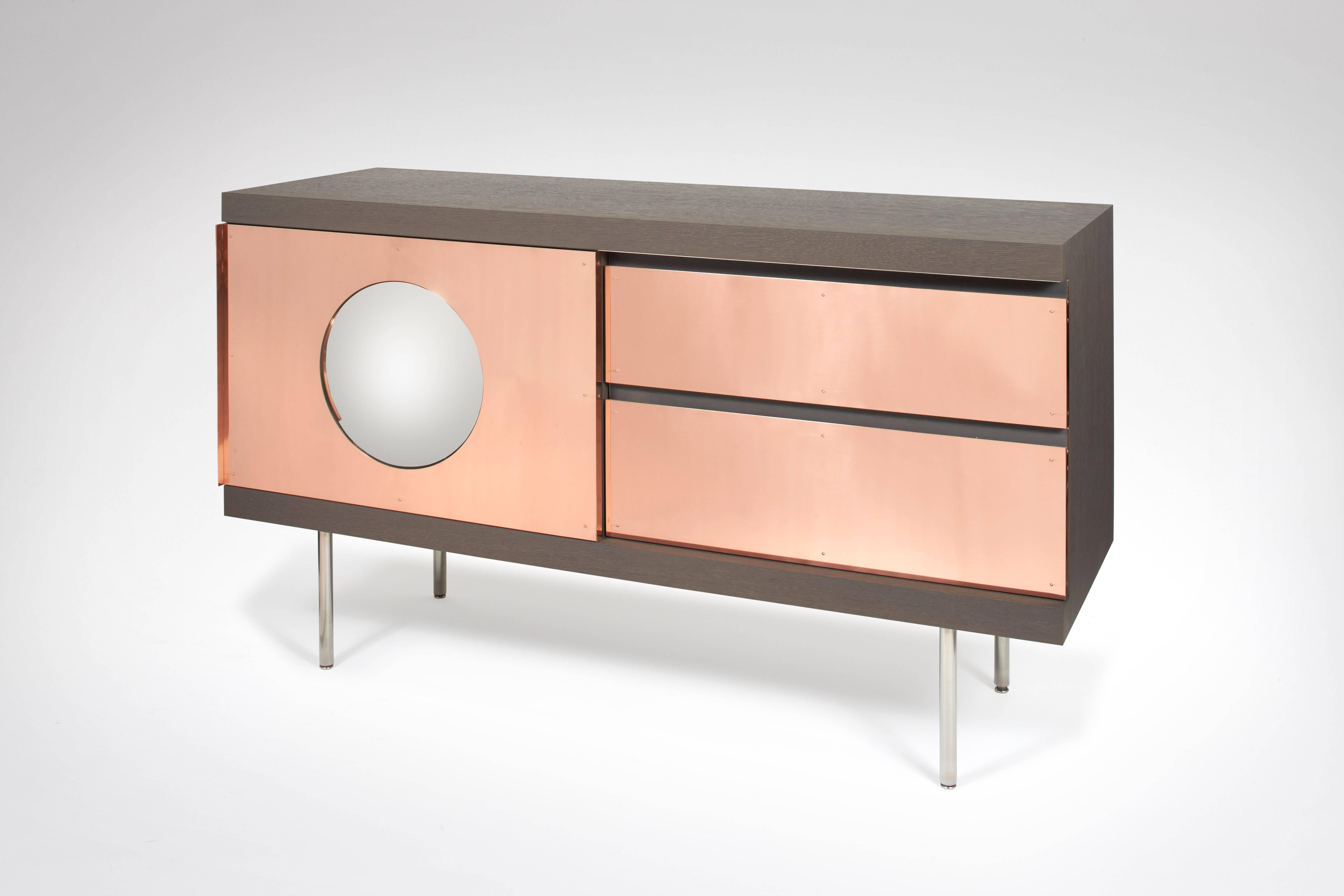 Brushed Alice. Sideboard; brushed stained oak. Copper. Convex mirror. Patrick Naggar.