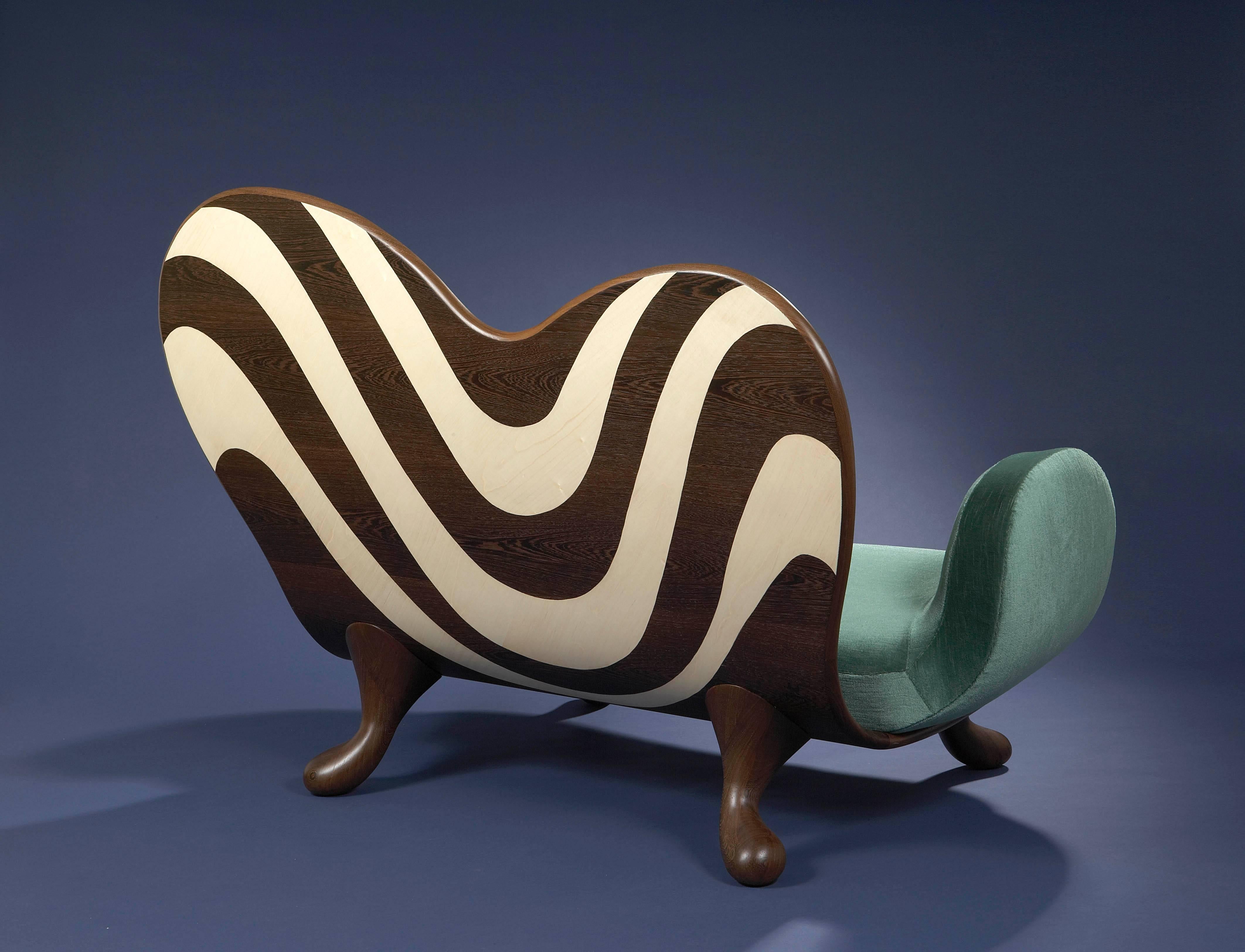 Surf.
Cat-Berro Edition 2006. 
Sofa.
Veneer of wenge and sycamore wood.
Sculpted wenge wood feet.

H: 111cm. L: 152 cm.P: 95cm.
Signed piece of a limited edition of 8 + 2AP + 2P.
Delivery time: 10 to 12 weeks.
Pricing does not include sales tax