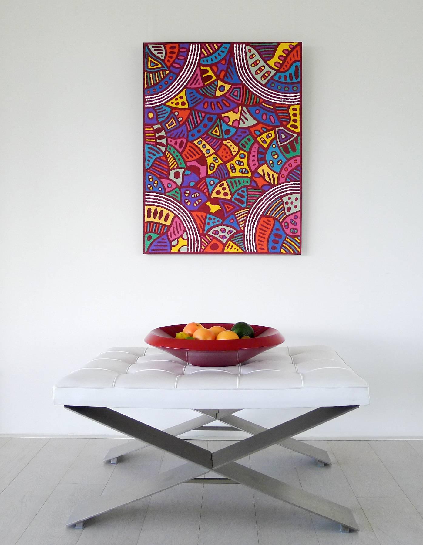 'Minyma Tjukurla' by Andrea Giles.

This bright and lively patterned painting is by younger generation artist Andrea Giles. Utilising a graphic style with bold shapes and bright colours, this painting has drawn comparisons with the work of Keith