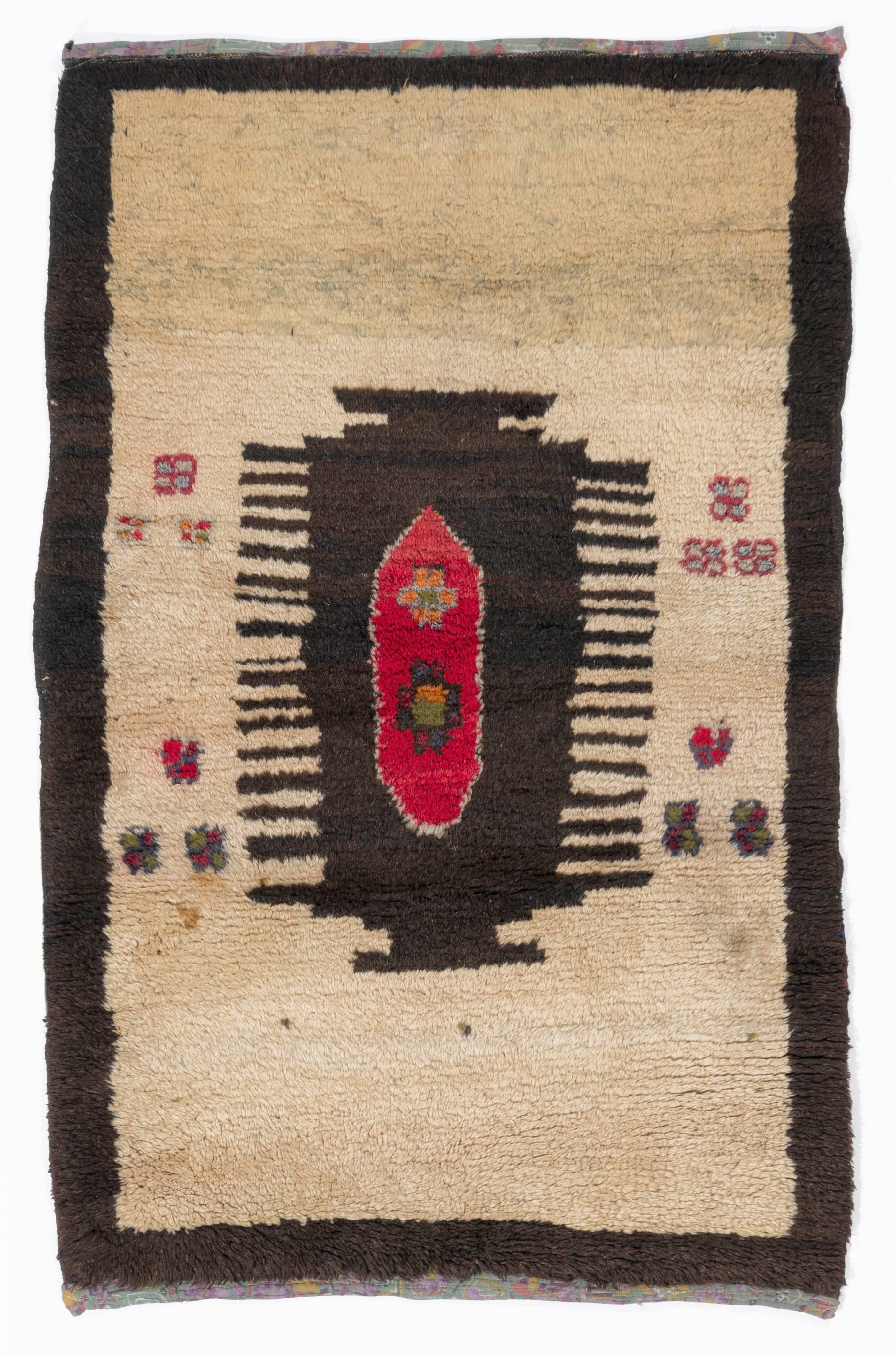 A unique old "Tulu" (Turkish word for shag piled) rug from Central Anatolia. 100% wool. 

These charming and somewhat Primitive small rugs with long wool pile were produced for daily use by the nomads and villagers in Central Anatolia