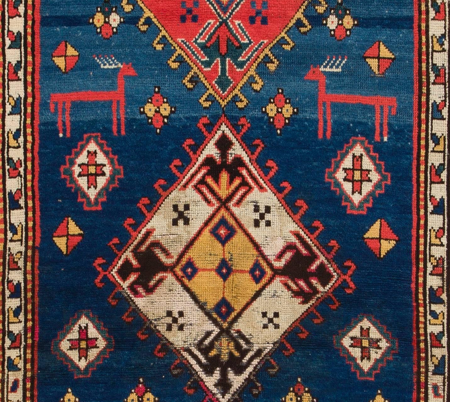 Antique Caucasian Kazak rug.